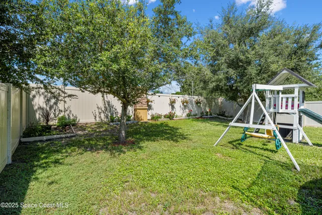 a view of a house with a park