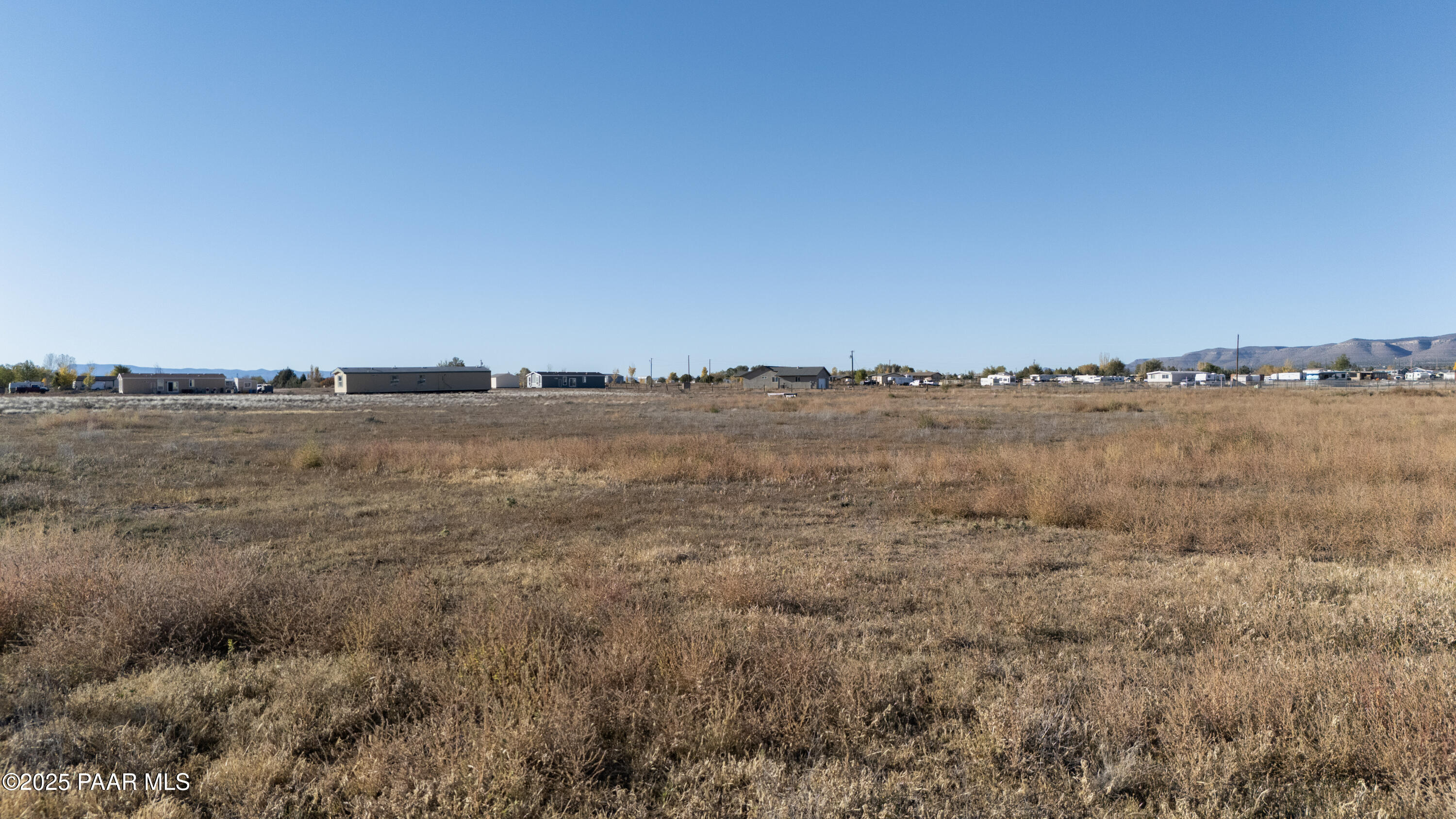 22 West Ranch House Road Paulden, AZ 86334 - Photo 20 of 29 a view of a lake with houses in the back