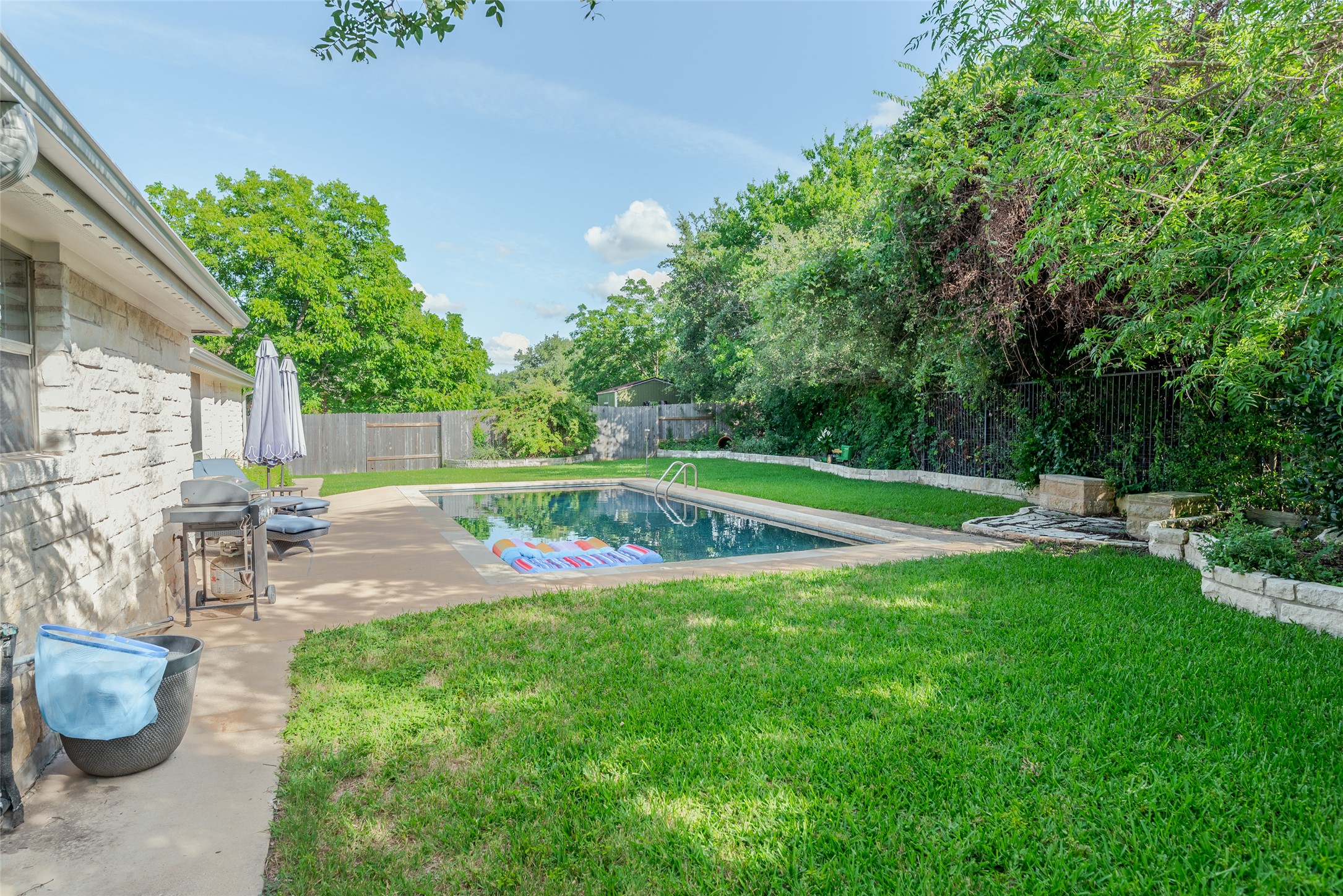 748 Nelson Ranch Road Cedar Park, TX 78613 - Photo 21 of 24 a view of a swimming pool with a patio