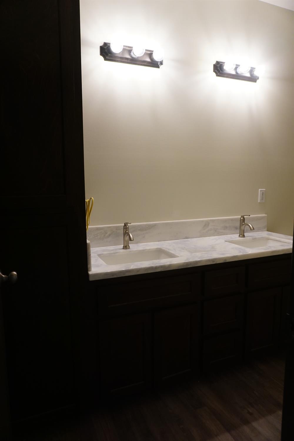17573 Daley Road Madera, CA 93638 - Photo 21 of 23 Example of completed guest bathroom. Actual home may vary slightly.