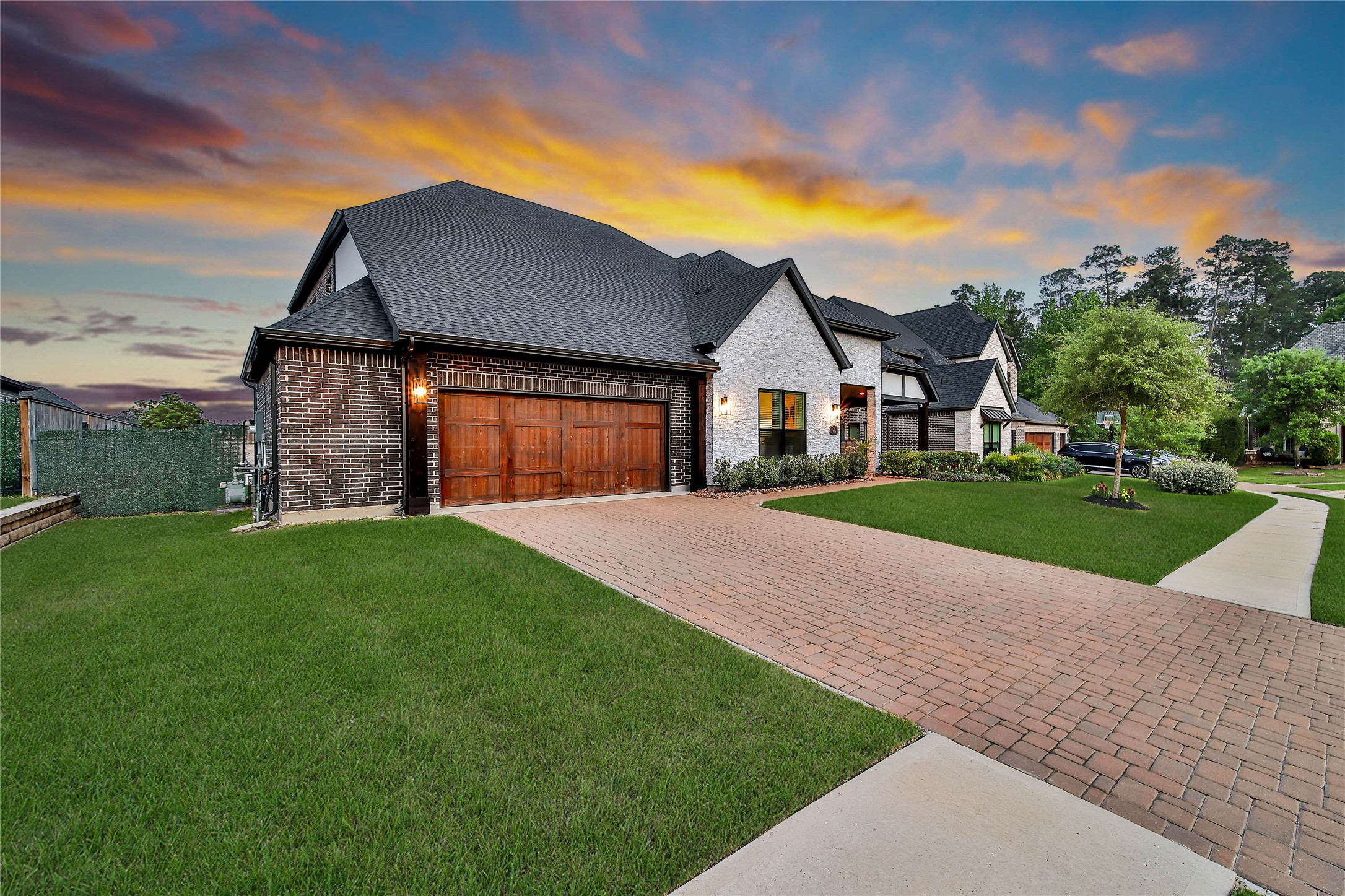 1015 Oak Briar Lane Conroe, TX 77384 - Photo 3 of 50 a front view of a house with a yard and garage
