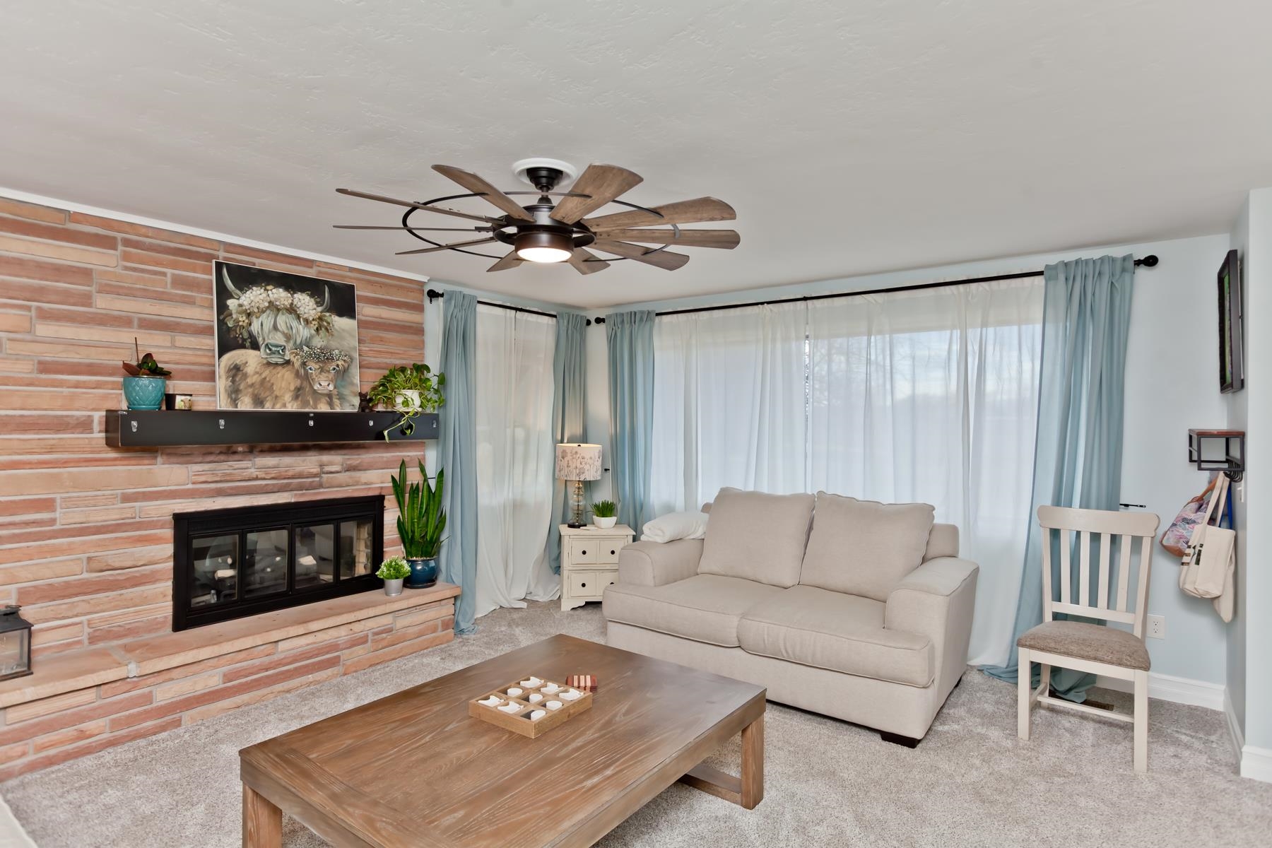 2520 G G 3/8 Road Grand Junction, CO 81505 - Photo 12 of 39 a living room with furniture and a fireplace