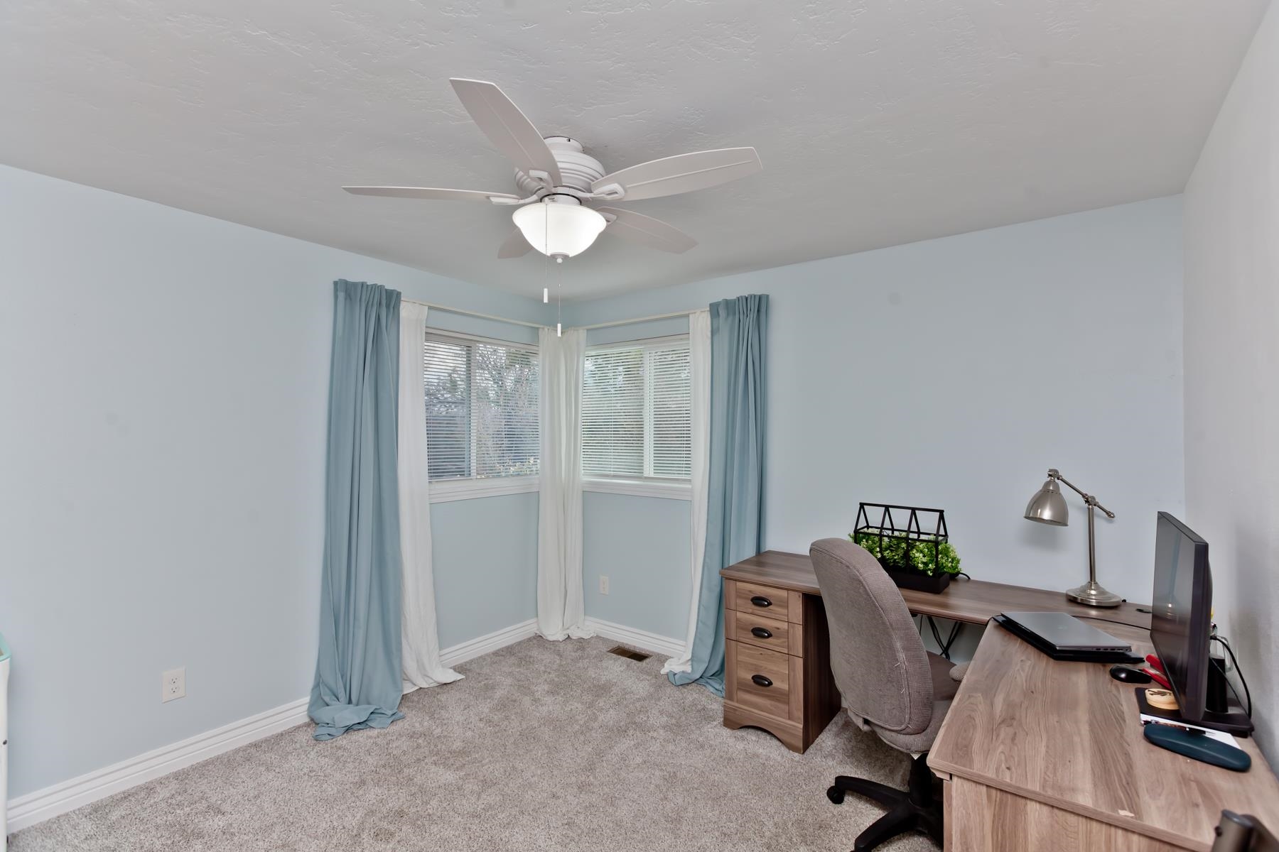 2520 G G 3/8 Road Grand Junction, CO 81505 - Photo 16 of 39 a view of a workspace with furniture and a window