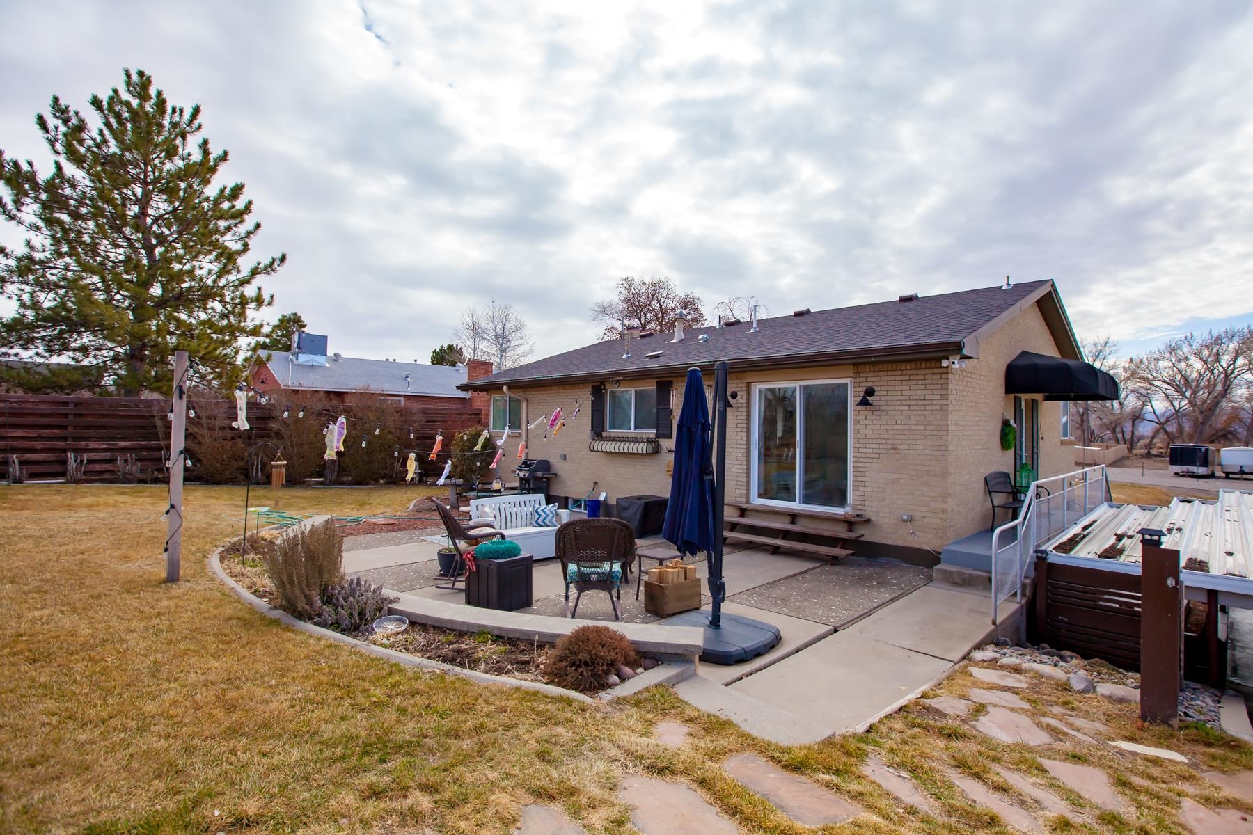 2520 G G 3/8 Road Grand Junction, CO 81505 - Photo 2 of 39 a front view of house with yard slide barbeque oven and barbeque oven