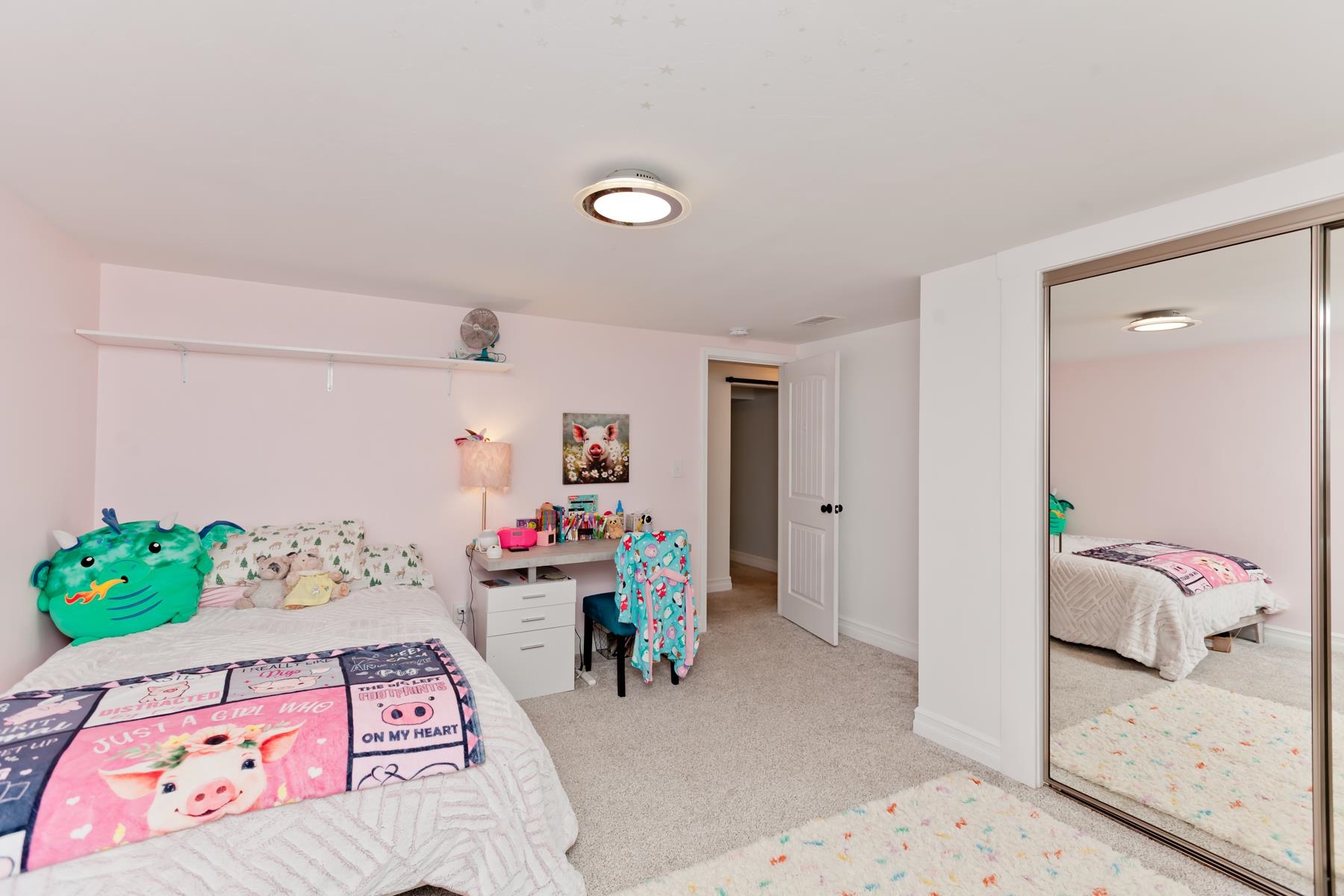 2520 G G 3/8 Road Grand Junction, CO 81505 - Photo 22 of 39 a bedroom with a bed and a table in it