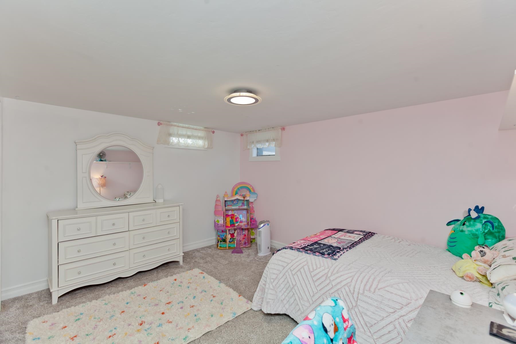 2520 G G 3/8 Road Grand Junction, CO 81505 - Photo 23 of 39 a bedroom with a bed table and a couch