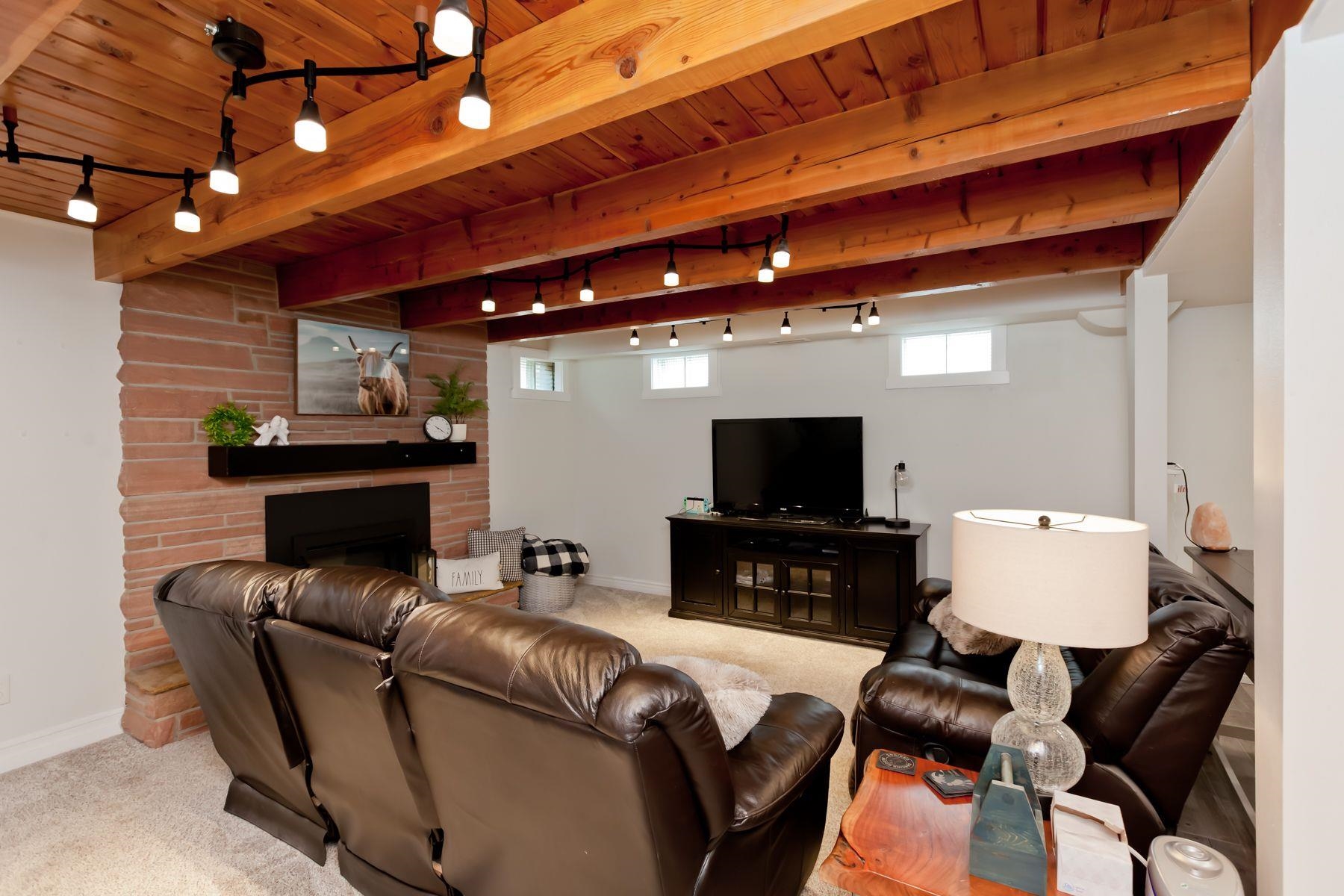 2520 G G 3/8 Road Grand Junction, CO 81505 - Photo 28 of 39 a living room with furniture and a flat screen tv