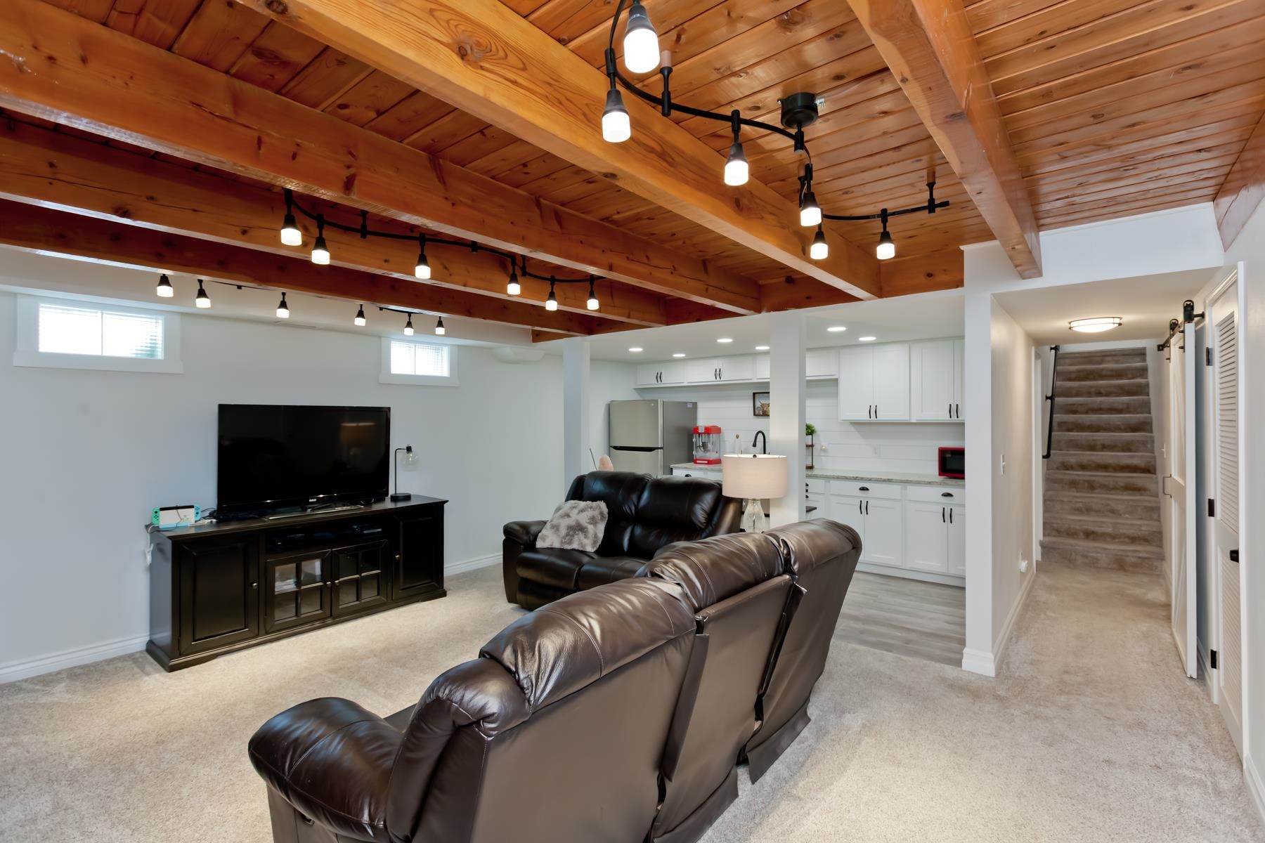2520 G G 3/8 Road Grand Junction, CO 81505 - Photo 29 of 39 a living room with furniture and a flat screen tv