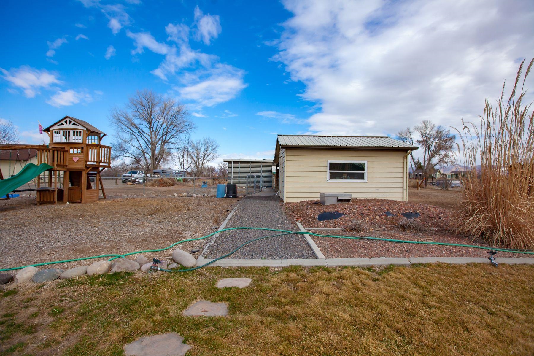2520 G G 3/8 Road Grand Junction, CO 81505 - Photo 3 of 39 a view of a house with a yard