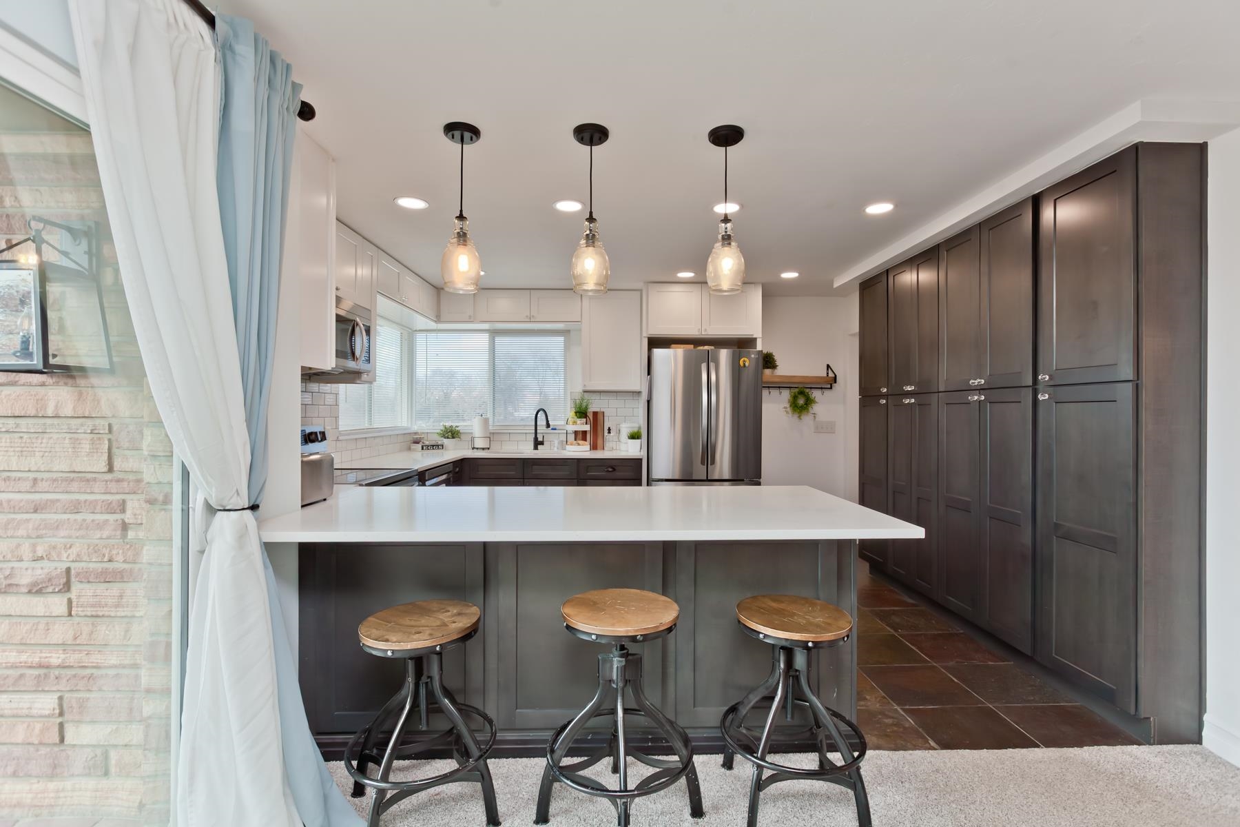 2520 G G 3/8 Road Grand Junction, CO 81505 - Photo 6 of 39 a large kitchen with a table and chairs