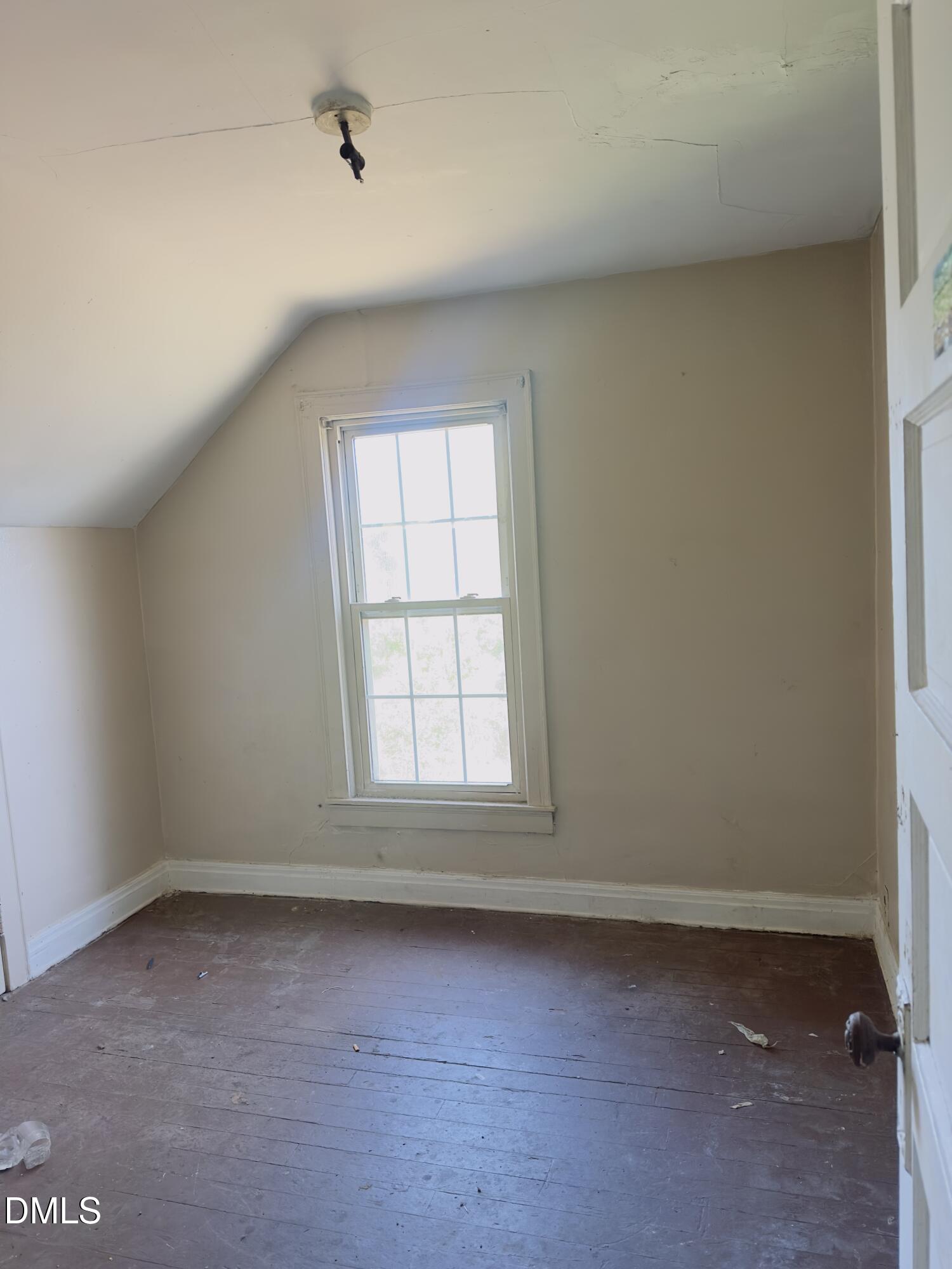 605 Rhem Street Kinston, NC 28501 - Photo 6 of 12 an empty room with a window