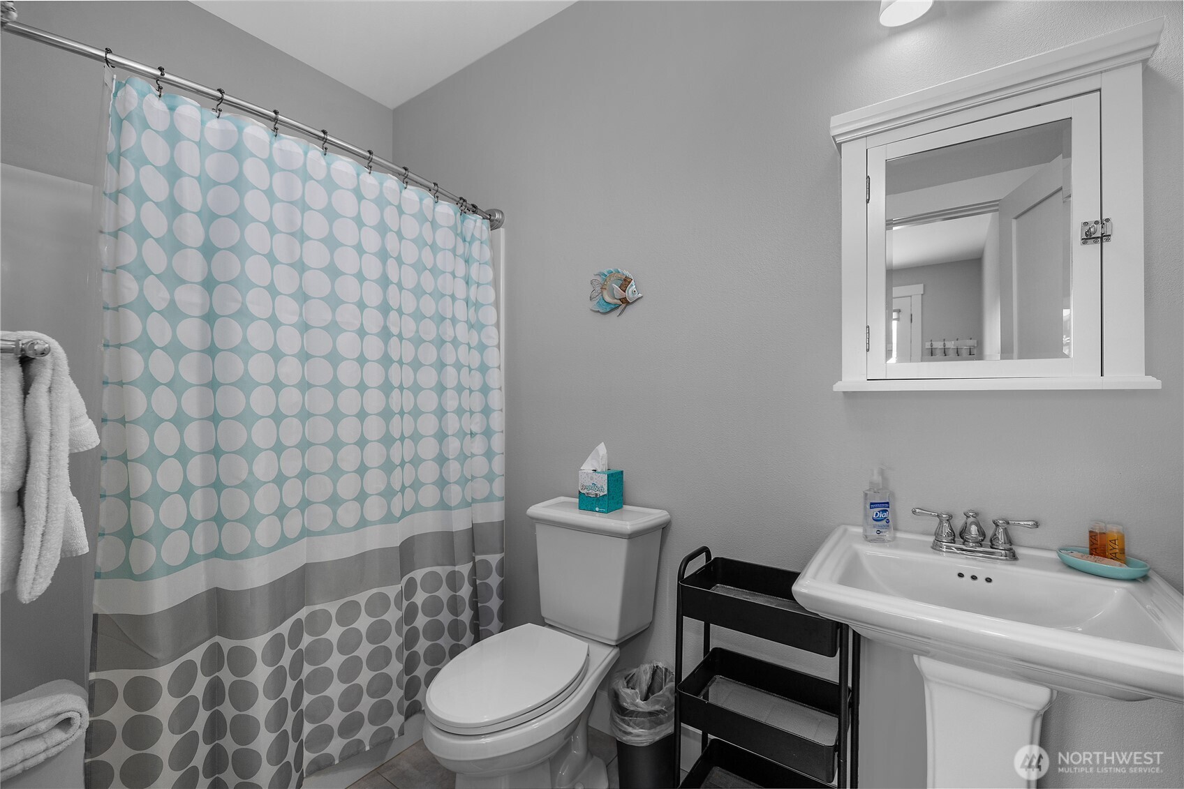 61 Horizon Street Pacific Beach, WA 98571 - Photo 19 of 29 a bathroom with a sink toilet and shower
