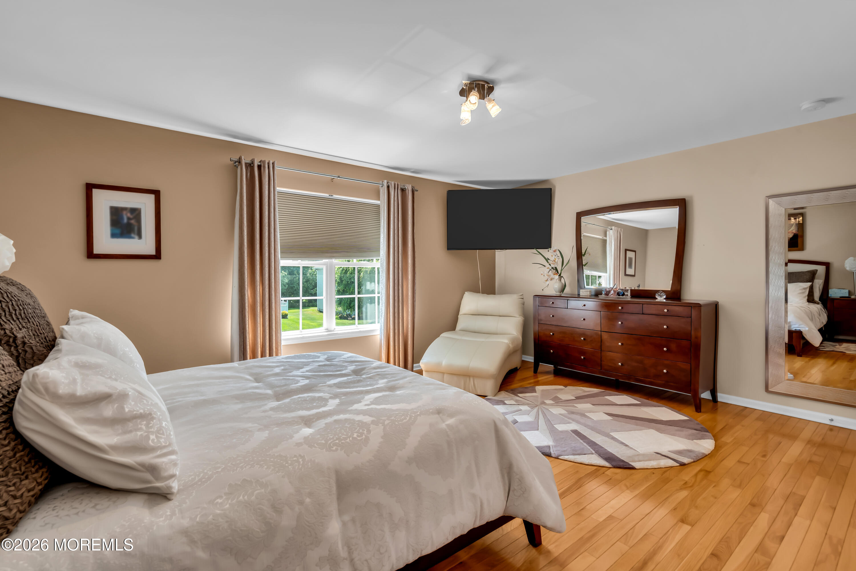 10 Beacon Place Old Bridge, NJ 08857 - Photo 40 of 72 a bedroom with a bed and wooden floor