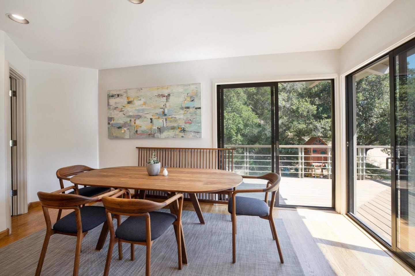 1275 La Canada Road Hillsborough, CA 94010 - Photo 26 of 85 a view of a dining room with furniture large window and wooden floor