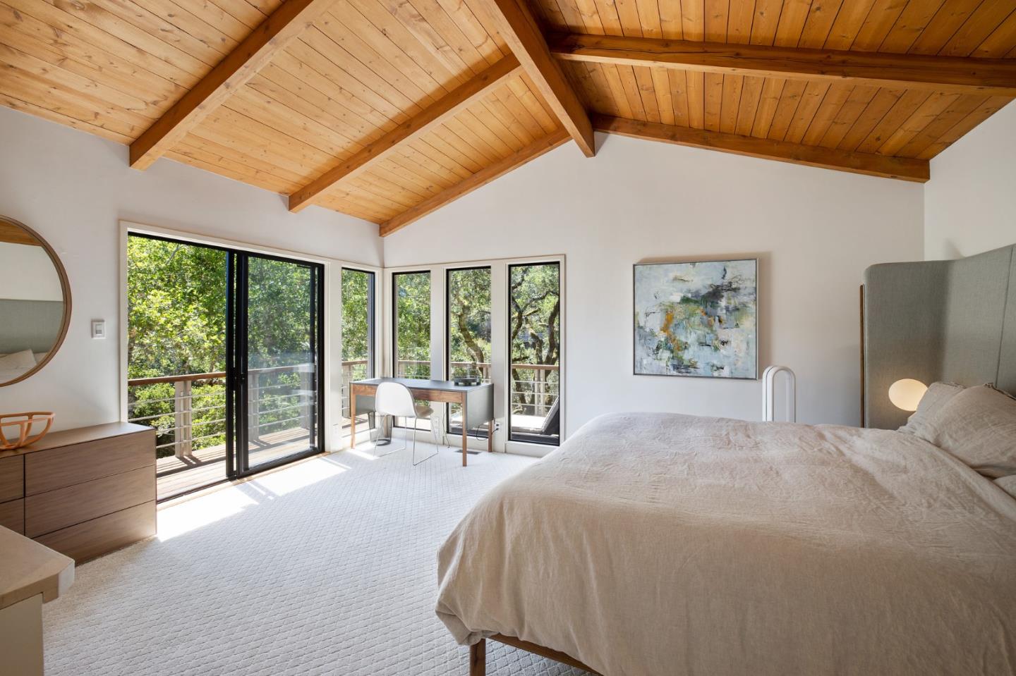 1275 La Canada Road Hillsborough, CA 94010 - Photo 29 of 85 a spacious bedroom with a bed and a large window