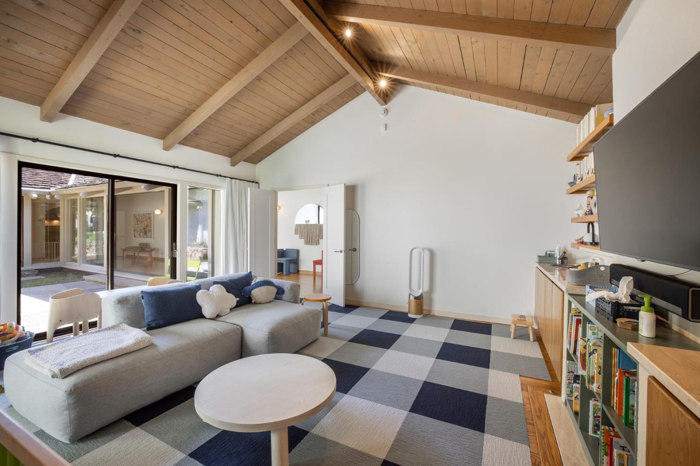 1275 La Canada Road Hillsborough, CA 94010 - Photo 34 of 85 a living room with furniture and a black gate