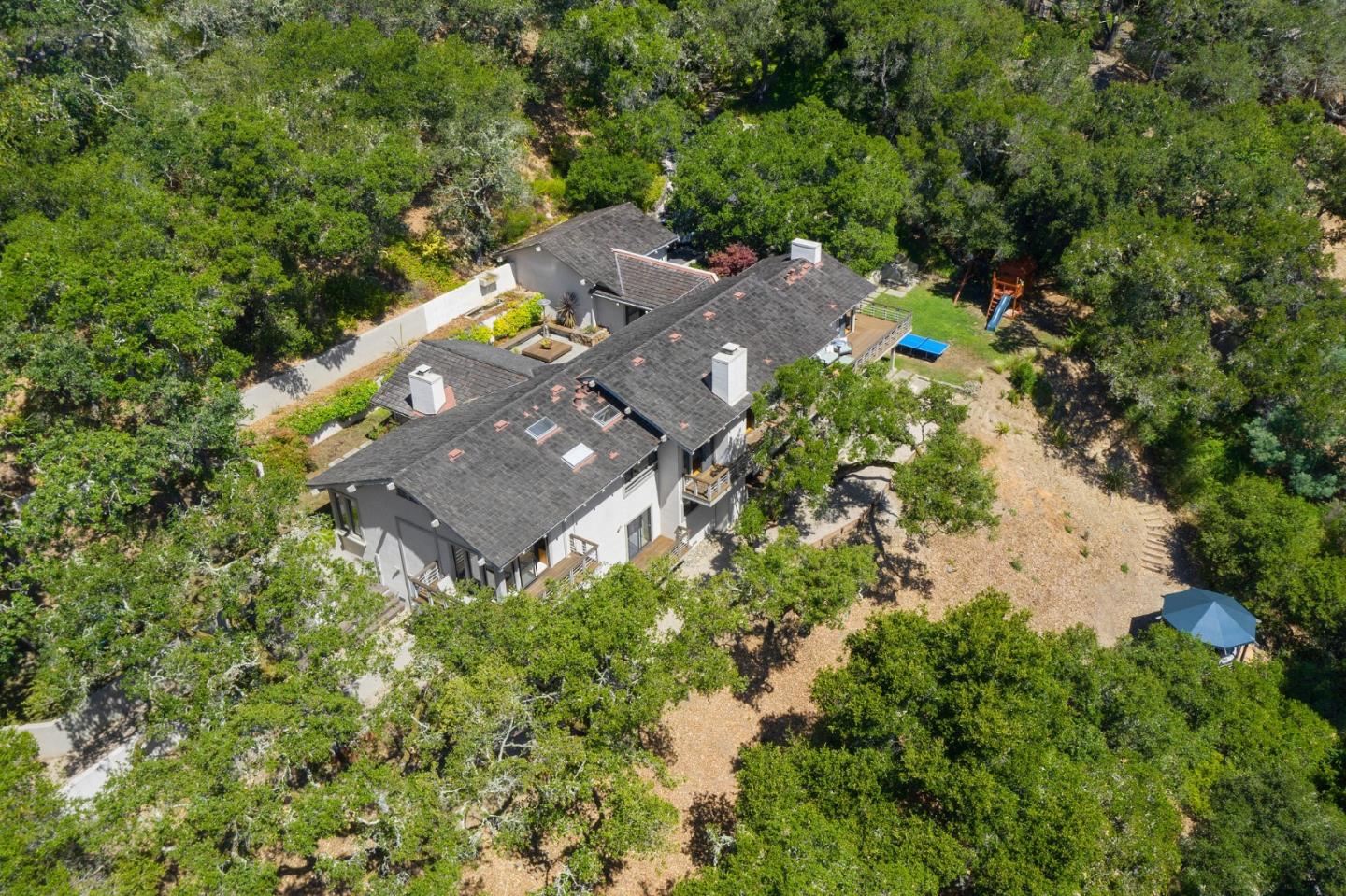 1275 La Canada Road Hillsborough, CA 94010 - Photo 4 of 85 an aerial view of a house with a yard and swimming pool