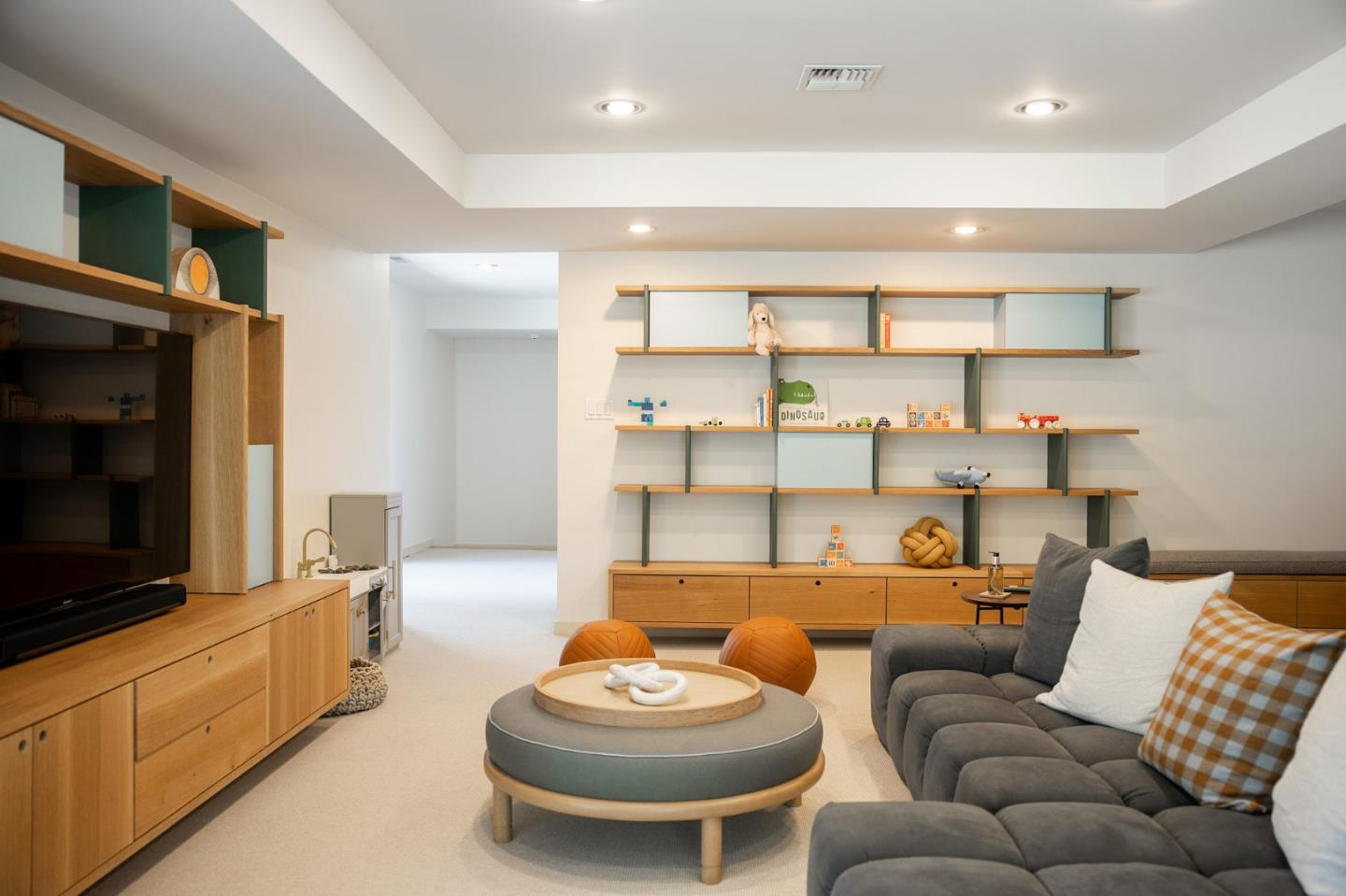 1275 La Canada Road Hillsborough, CA 94010 - Photo 48 of 85 a living room with furniture a flat screen tv and kitchen view