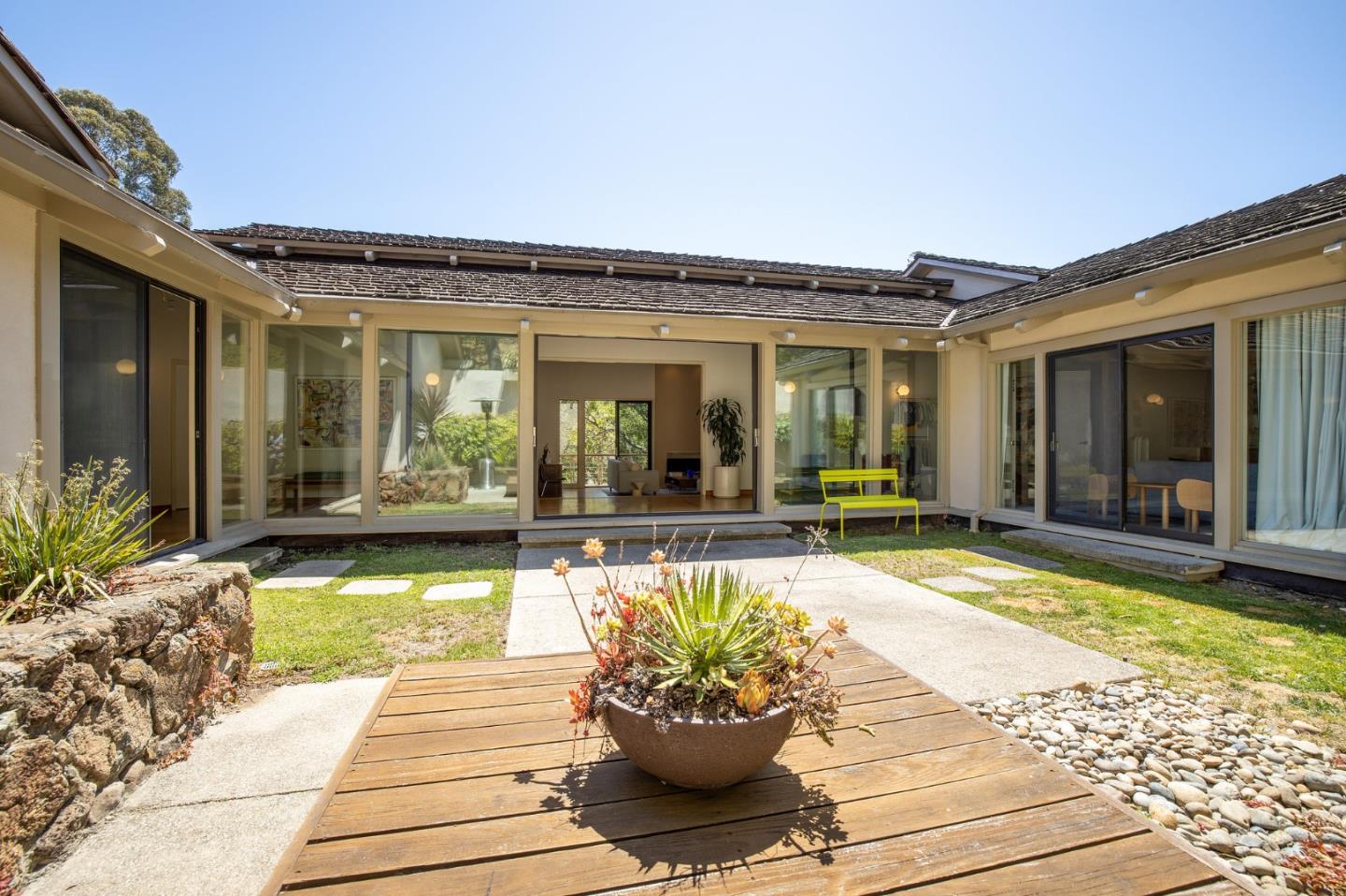 1275 La Canada Road Hillsborough, CA 94010 - Photo 53 of 85 a view of a house with swimming pool and porch with furniture