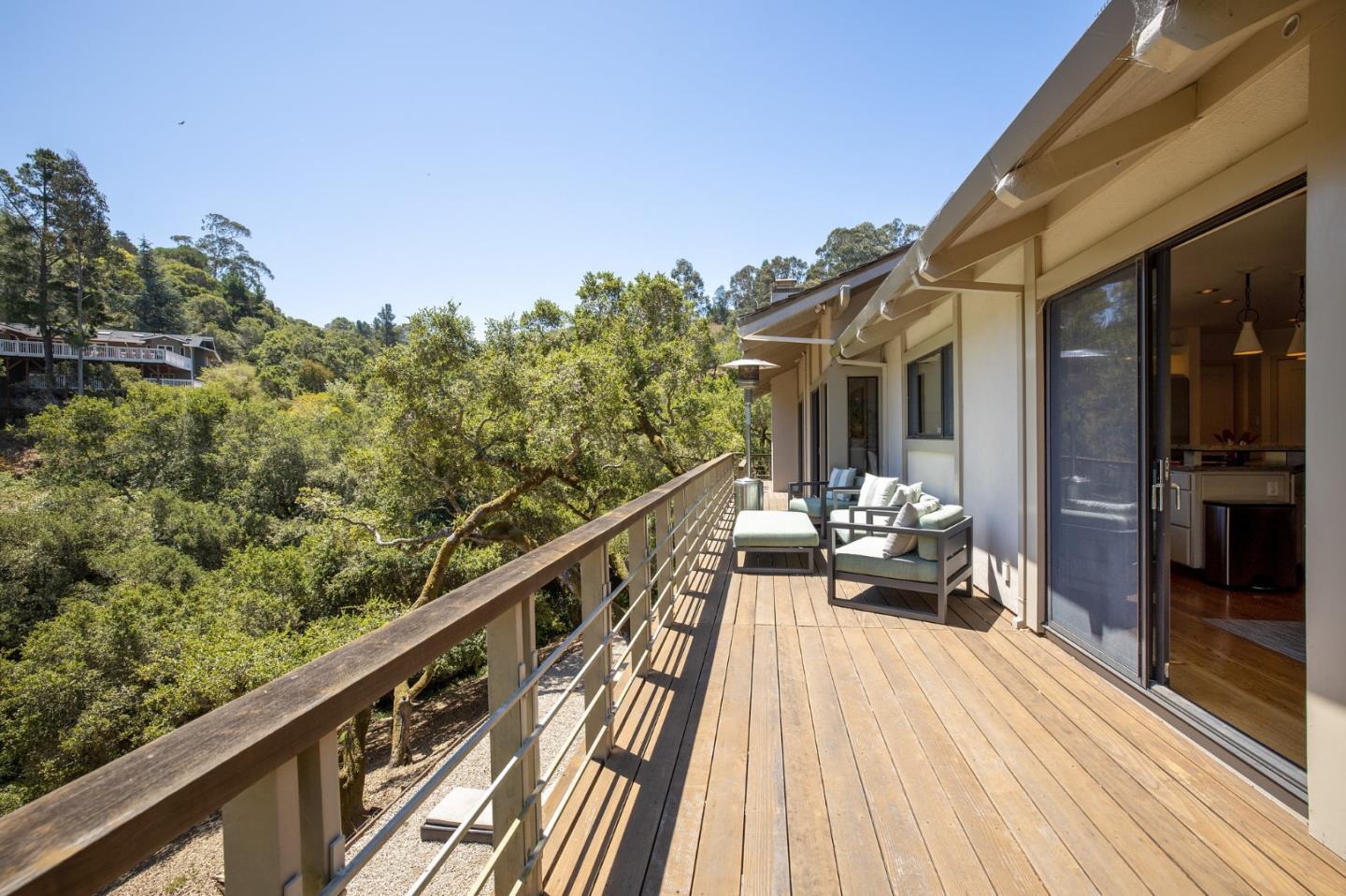 1275 La Canada Road Hillsborough, CA 94010 - Photo 55 of 85 a view of balcony with chairs and wooden fence