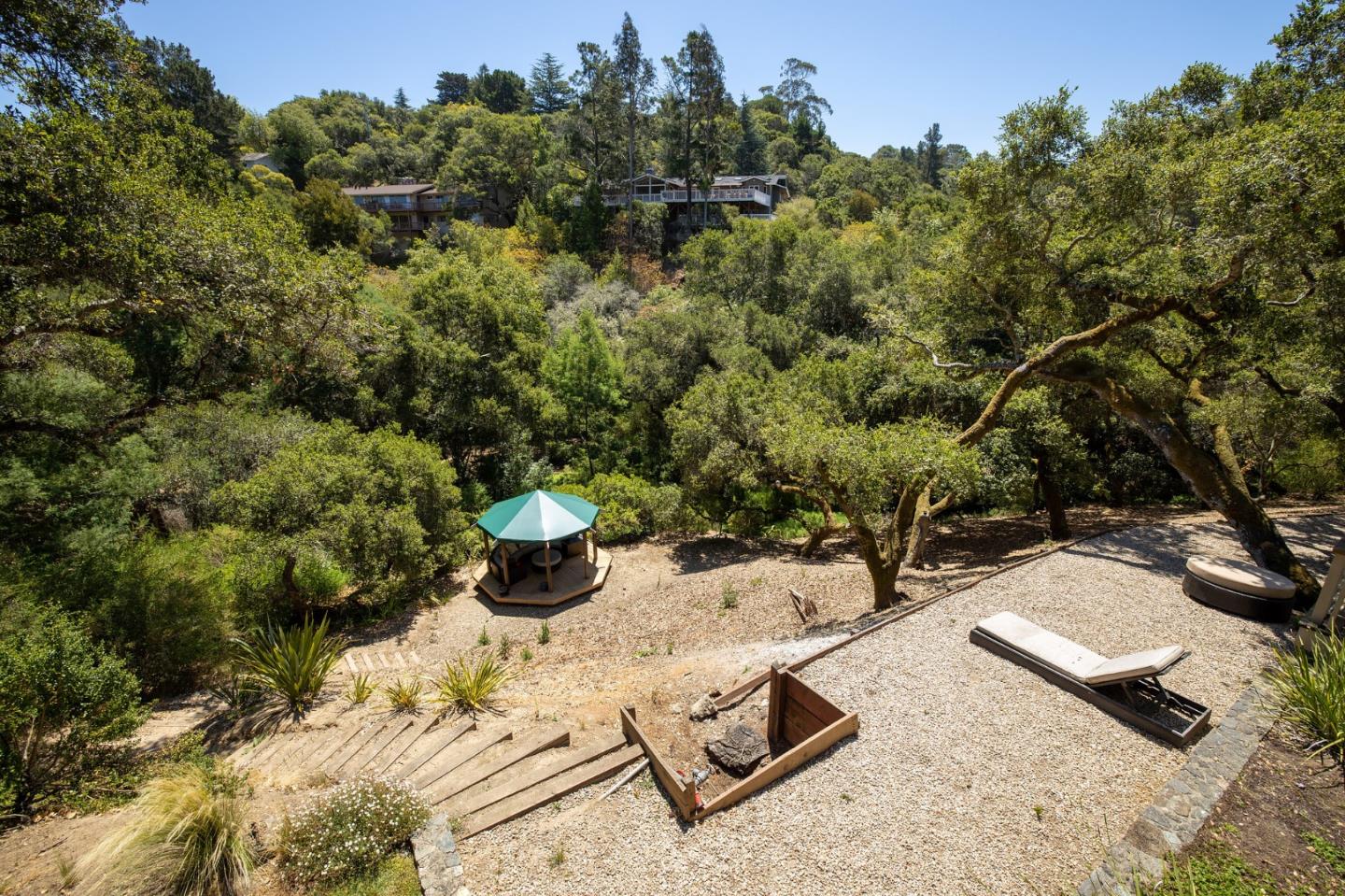 1275 La Canada Road Hillsborough, CA 94010 - Photo 60 of 85 a view of a backyard with sitting area