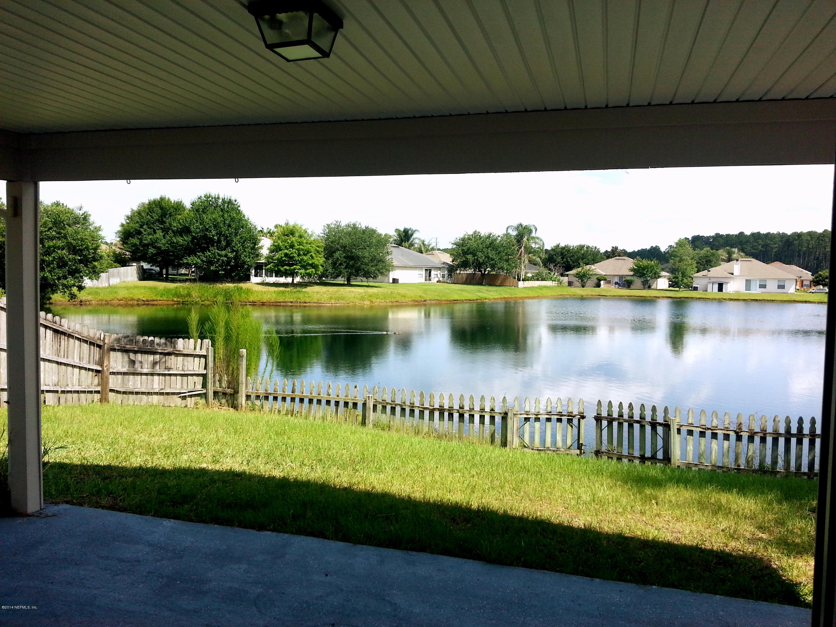 10198 Rising Mist Lane Jacksonville, FL 32221 - Photo 18 of 19 COVERED PATIO
