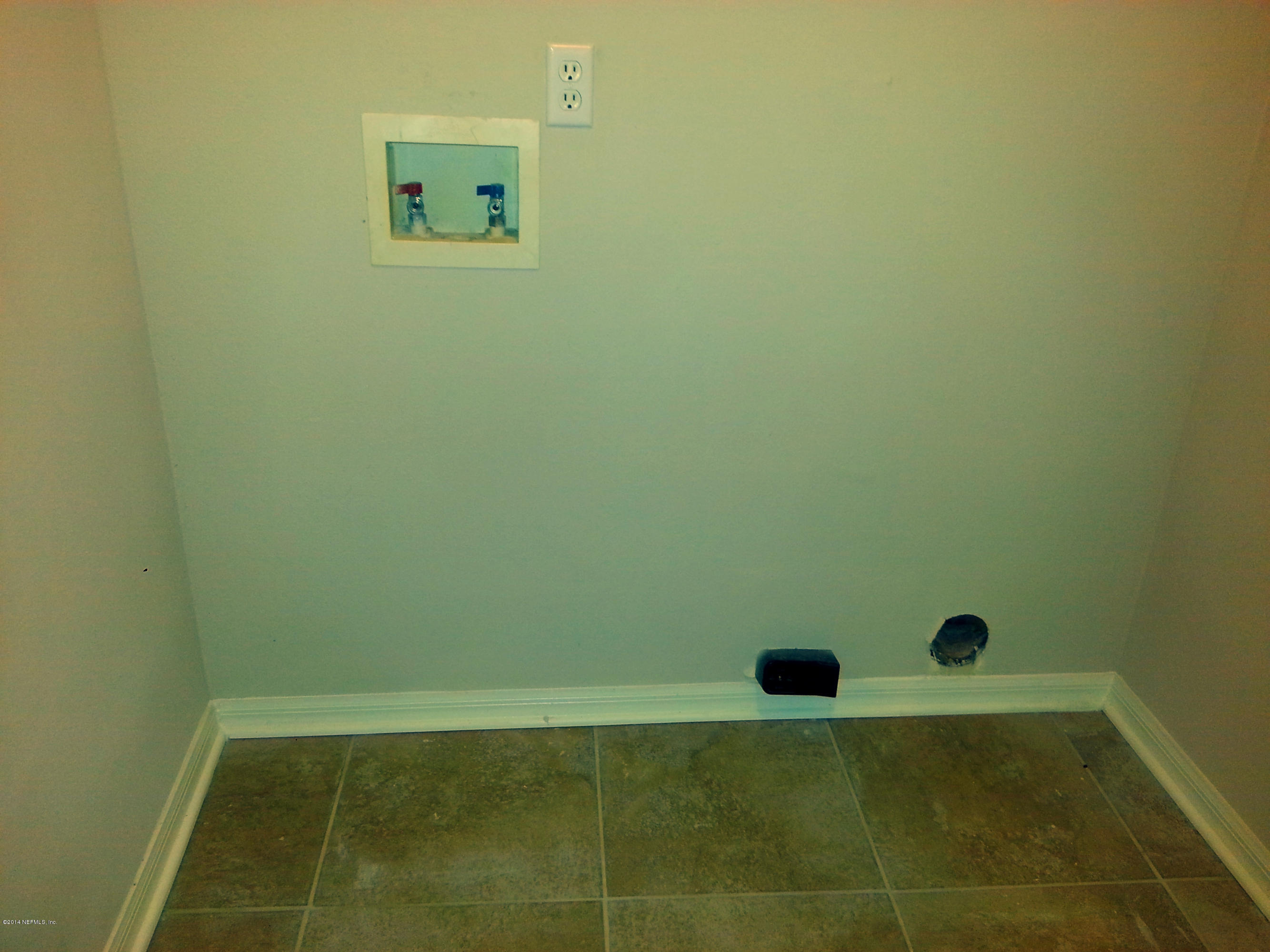 10198 Rising Mist Lane Jacksonville, FL 32221 - Photo 19 of 19 INSIDE LAUNDRY ROOM