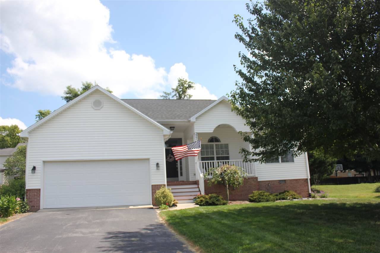 One-level living with 3 bedrooms, 2 baths, beautiful kitchen with solid-surface counter-tops, island  and stainless steel appliances, sunken living room with hardwood floors and fireplace and sunroom with cathedral ceiling.