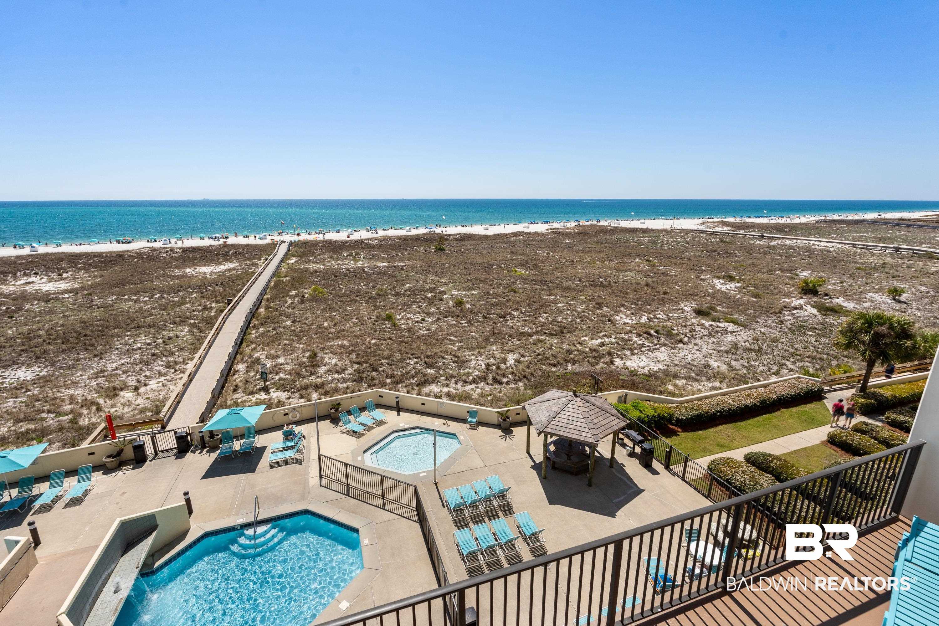 26802 Perdido Beach Boulevard, Unit 406 Orange Beach, AL 36561 - Photo 21 of 37 Bird's eye view of expansive coastline and a pool