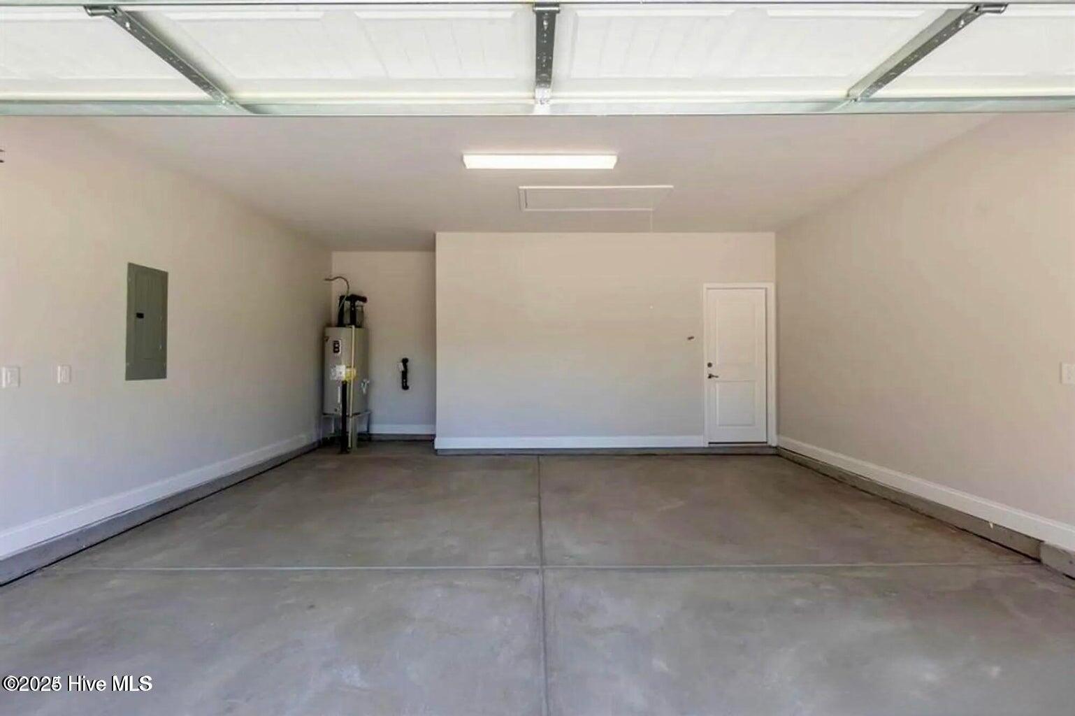 162 Poker House Road Grimesland, NC 27837 - Photo 17 of 27 Two-car garage. Photos are of the same floor plan in a different community and are for layout and demo purposes only. Upgrades, colors and finishes may differ. Home is currently under construction.