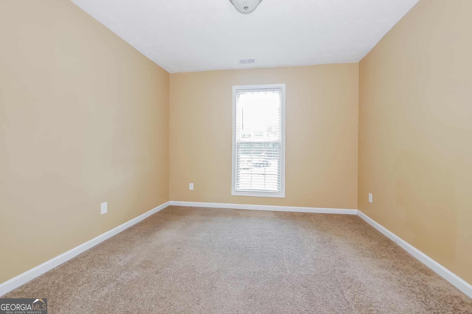 4468 Abram Way Conley, GA 30288 - Photo 11 of 17 an empty room with a window