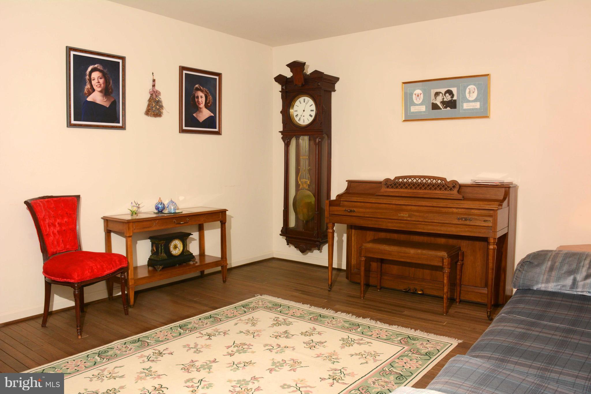 305 Riding Ridge Road Annapolis, MD 21403 - Photo 11 of 29 a room with furniture and a fireplace