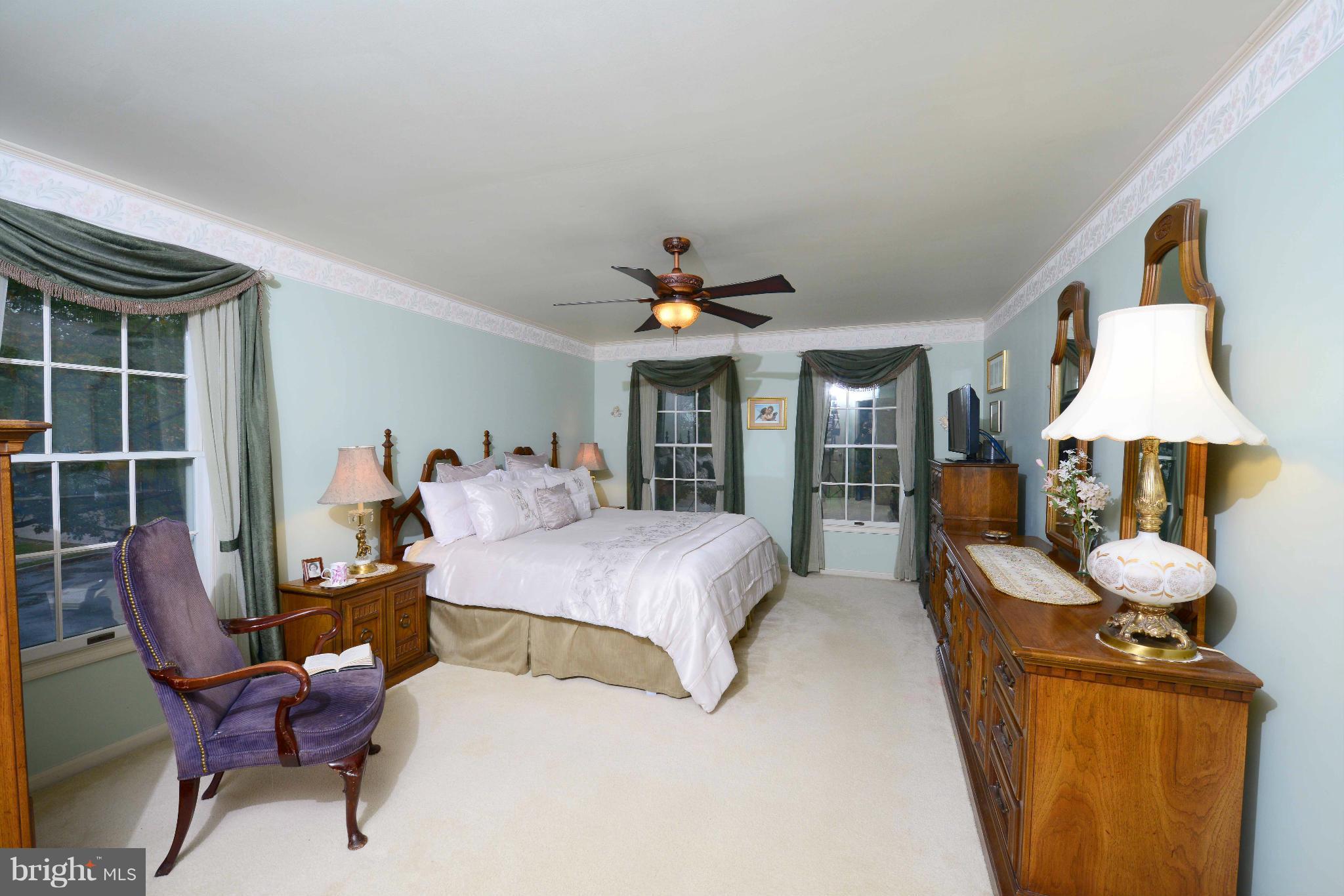 305 Riding Ridge Road Annapolis, MD 21403 - Photo 15 of 29 a bed room with furniture and a window