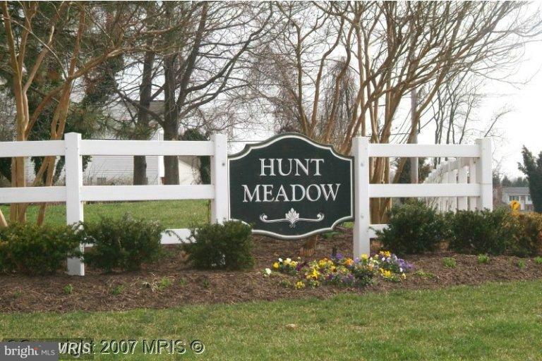 305 Riding Ridge Road Annapolis, MD 21403 - Photo 29 of 29 a sign that is sitting in front of a house