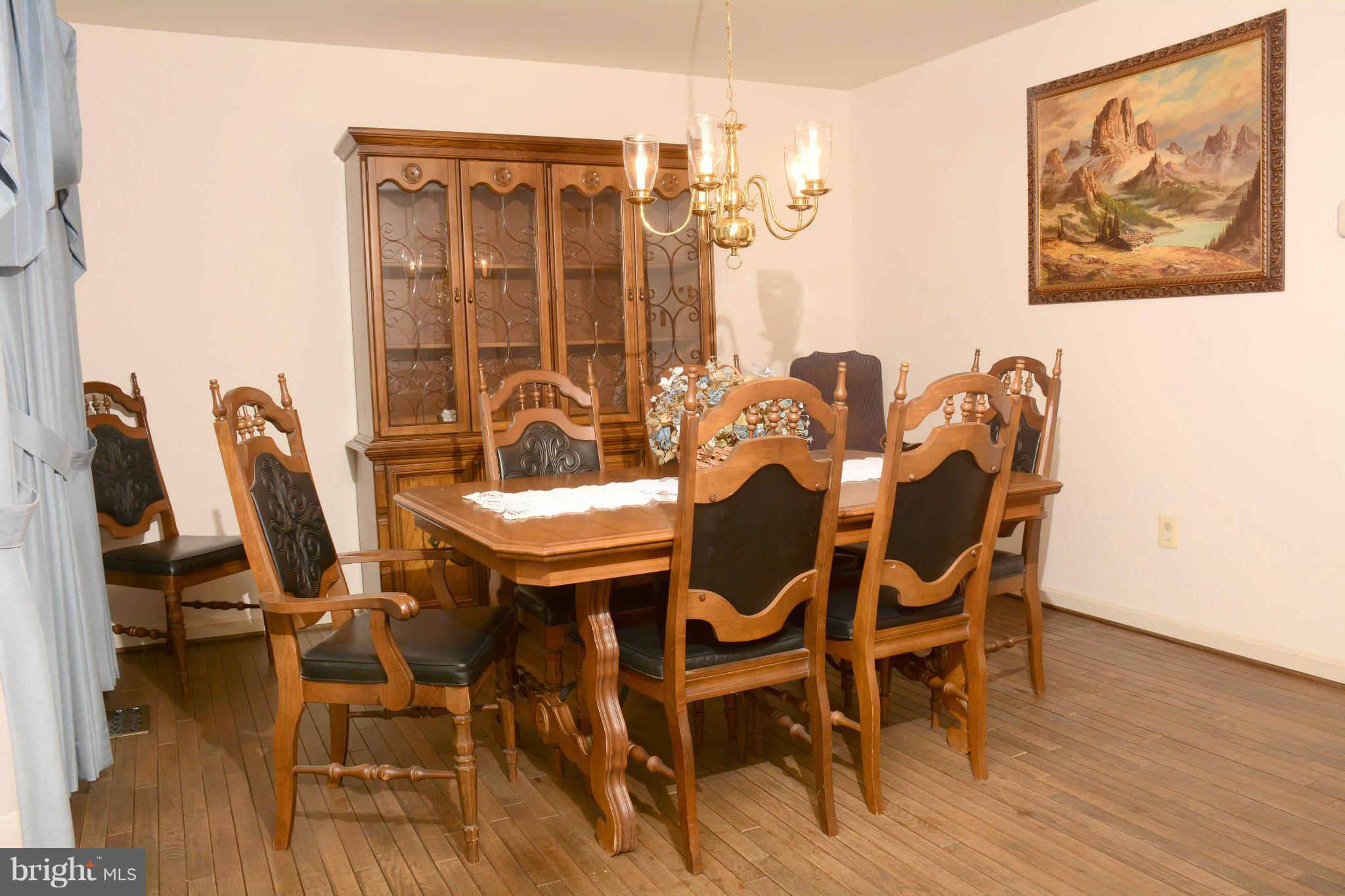 305 Riding Ridge Road Annapolis, MD 21403 - Photo 9 of 29 a dining room with furniture and wooden floor