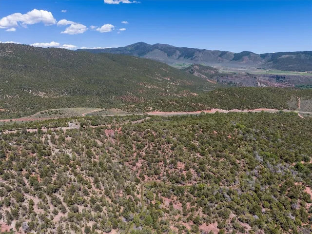 a view of mountain with sunset