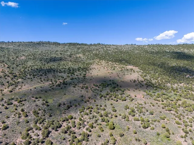 a view of mountain view with mountains in the background