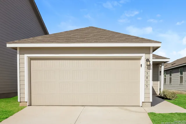 a view of a house with garage