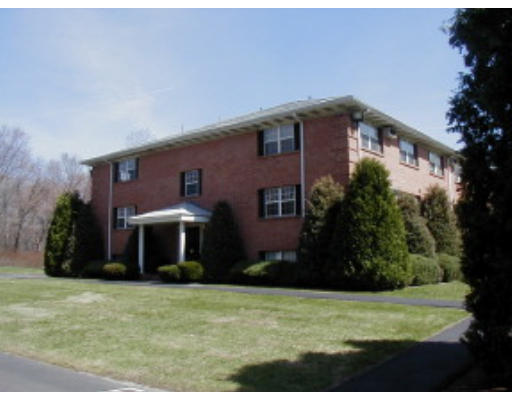 3 Leonard Road, Unit 3 1 Boxborough, MA 01719 - Photo 1 of 1 a front view of a house with a yard