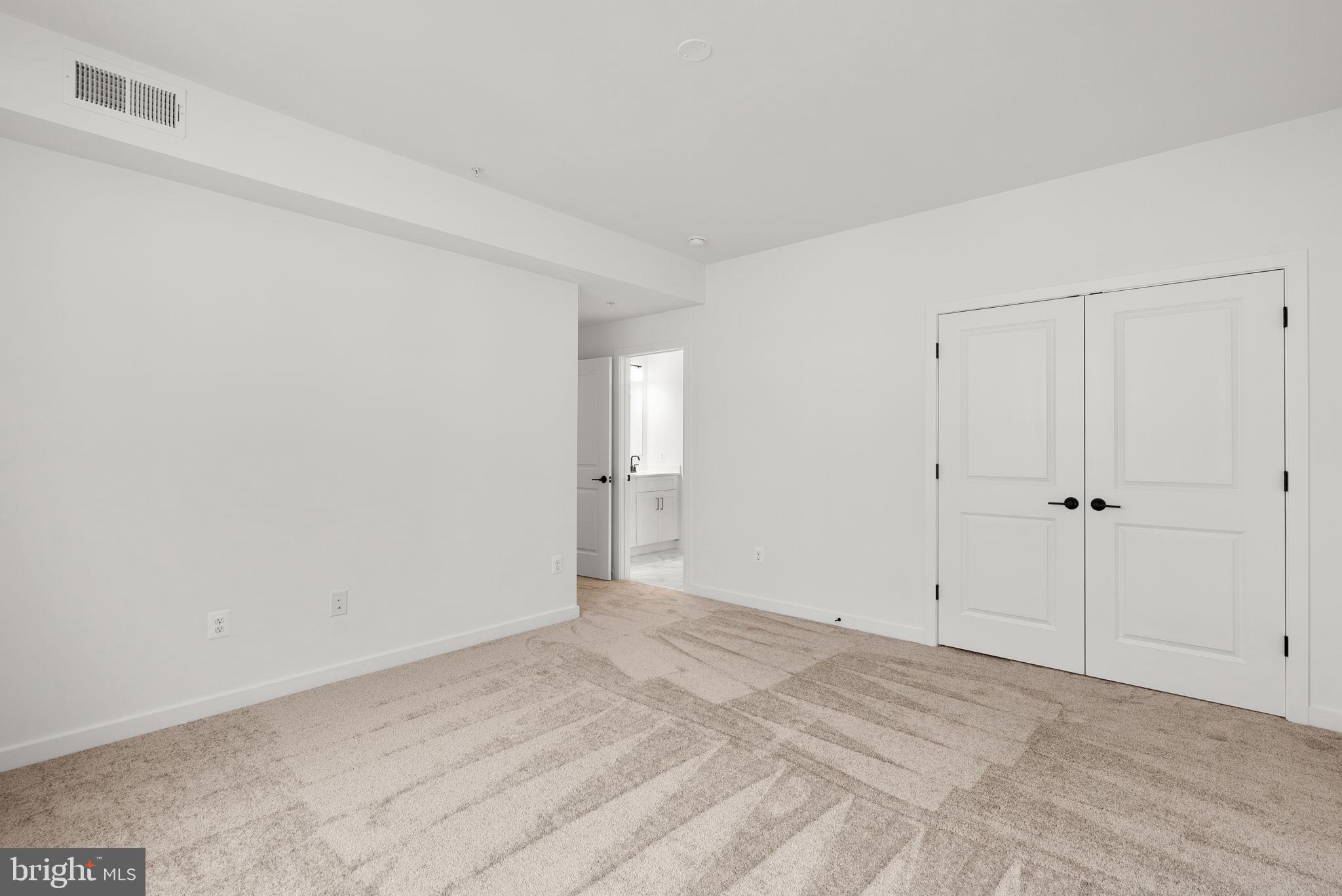 1631 Blacksmith Way, Unit 214B Frederick, MD 21702 - Photo 23 of 41 Primary Bedroom with Attached Bath