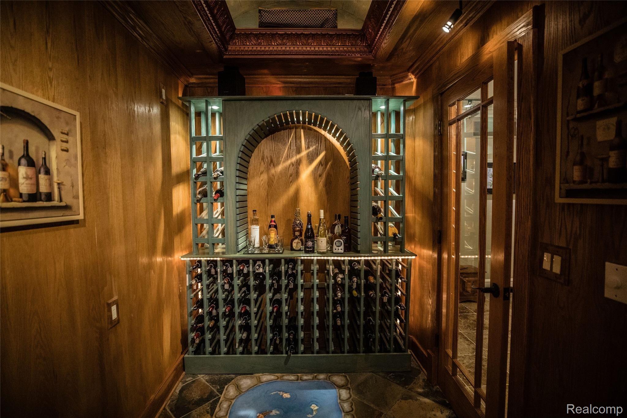 5542 Clarkston Road Clarkston, MI 48348 - Photo 53 of 85 WINE CELLAR; CUSTOM TRIM & LIGHTING