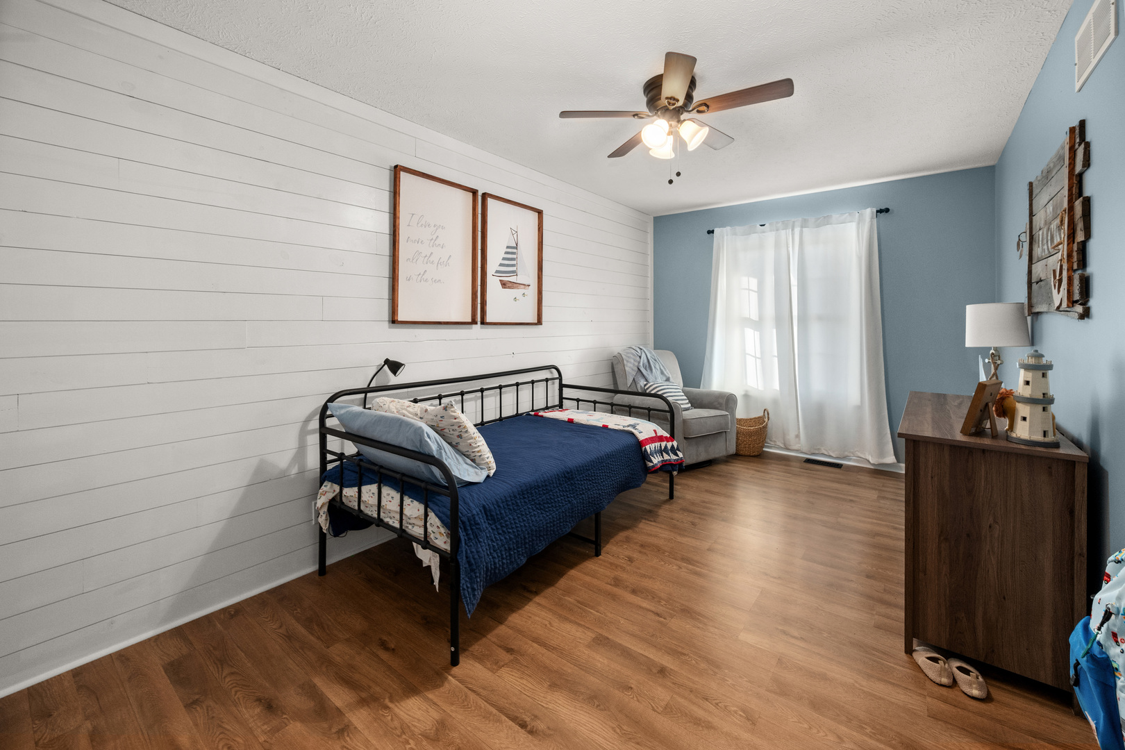 710 Hawthorne Lane Genoa, IL 60135 - Photo 14 of 24 a living room with furniture and wooden floor