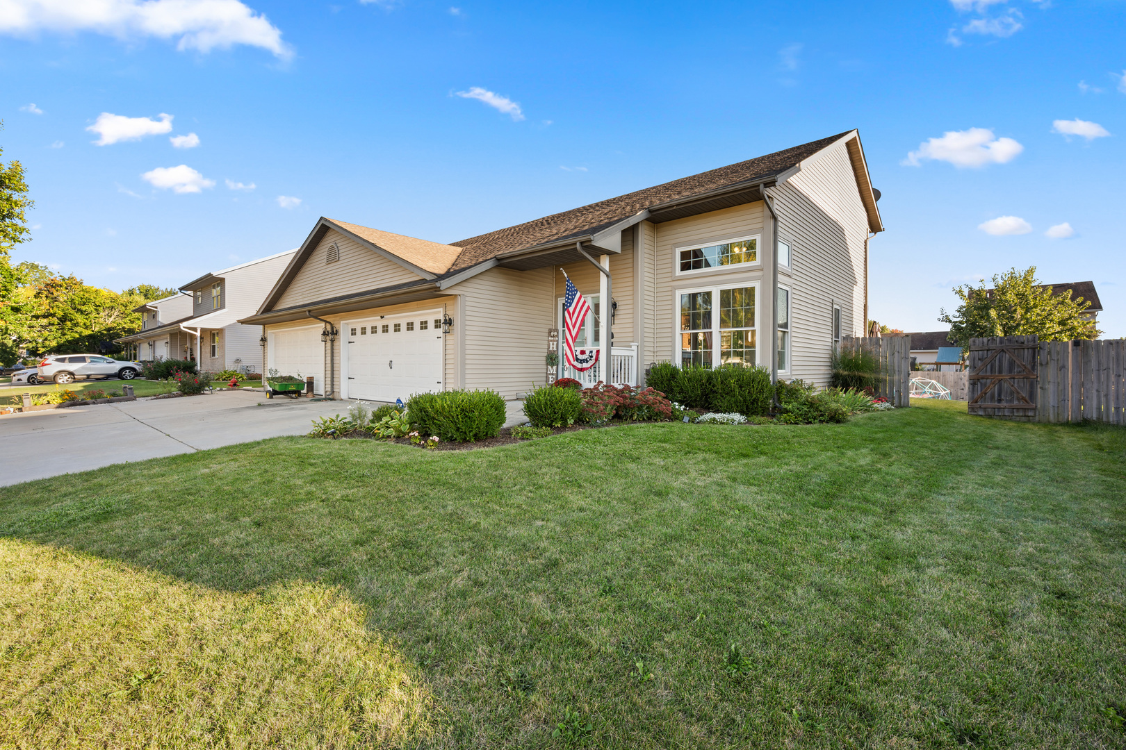 710 Hawthorne Lane Genoa, IL 60135 - Photo 2 of 24 a view of a house with a big yard plants and large trees