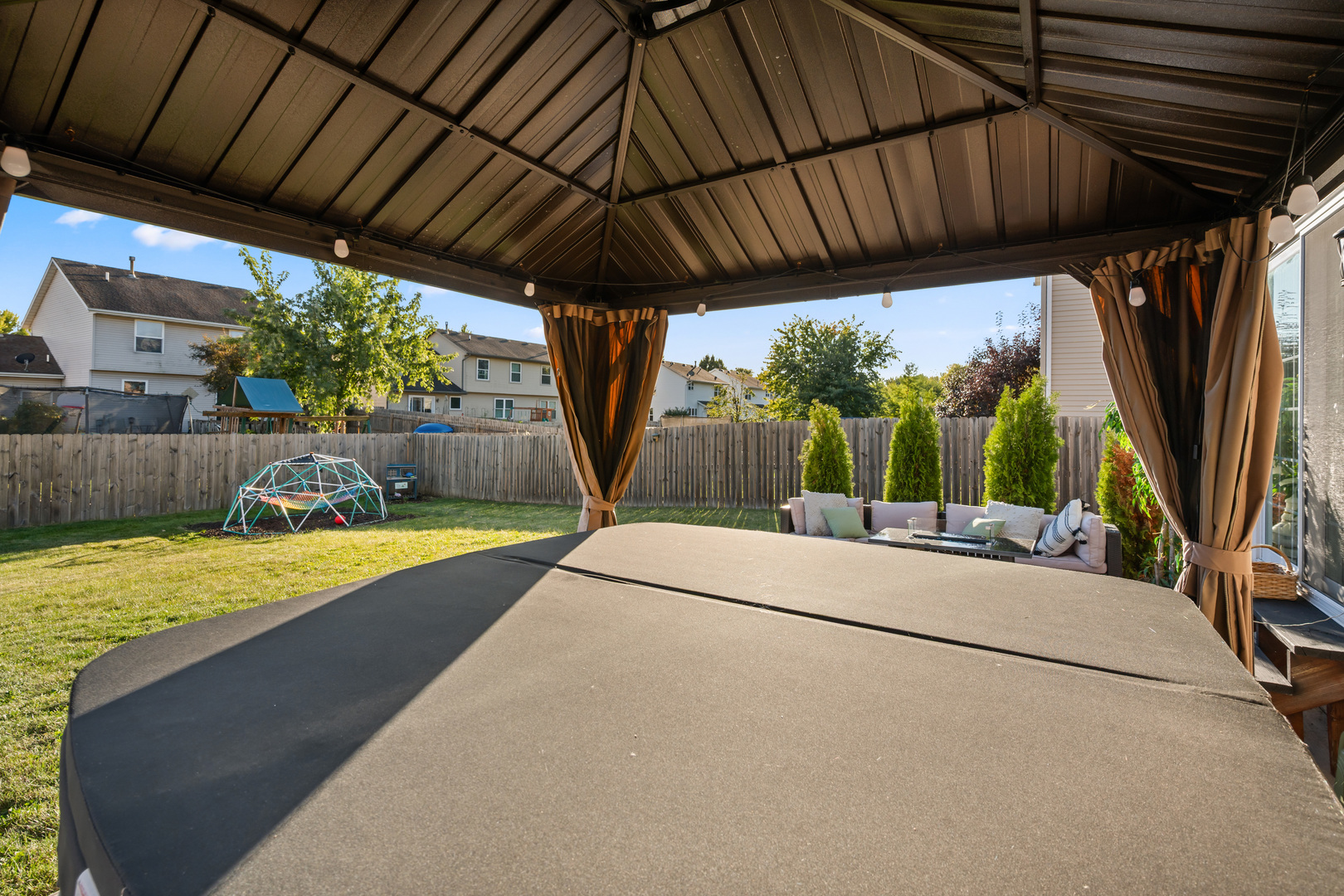 710 Hawthorne Lane Genoa, IL 60135 - Photo 22 of 24 a view of a backyard with a small cabin