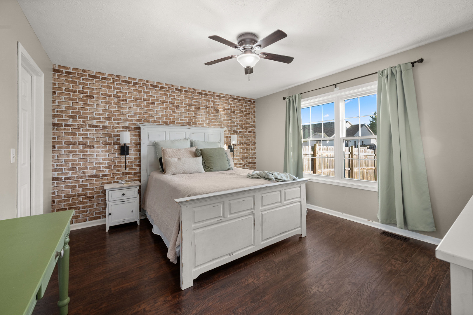 710 Hawthorne Lane Genoa, IL 60135 - Photo 10 of 24 a bed room with a bed and a window