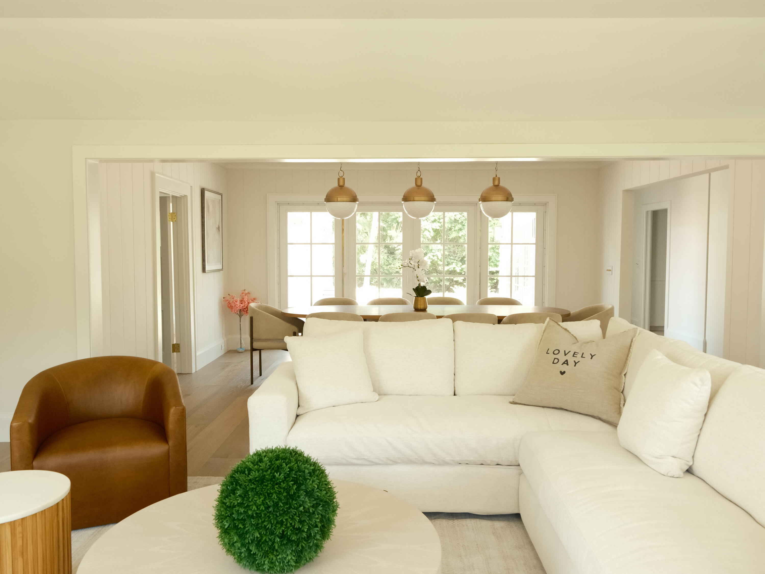 1017 Tamarind Road Delray Beach, FL 33483 - Photo 23 of 54 a living room with furniture and a large window