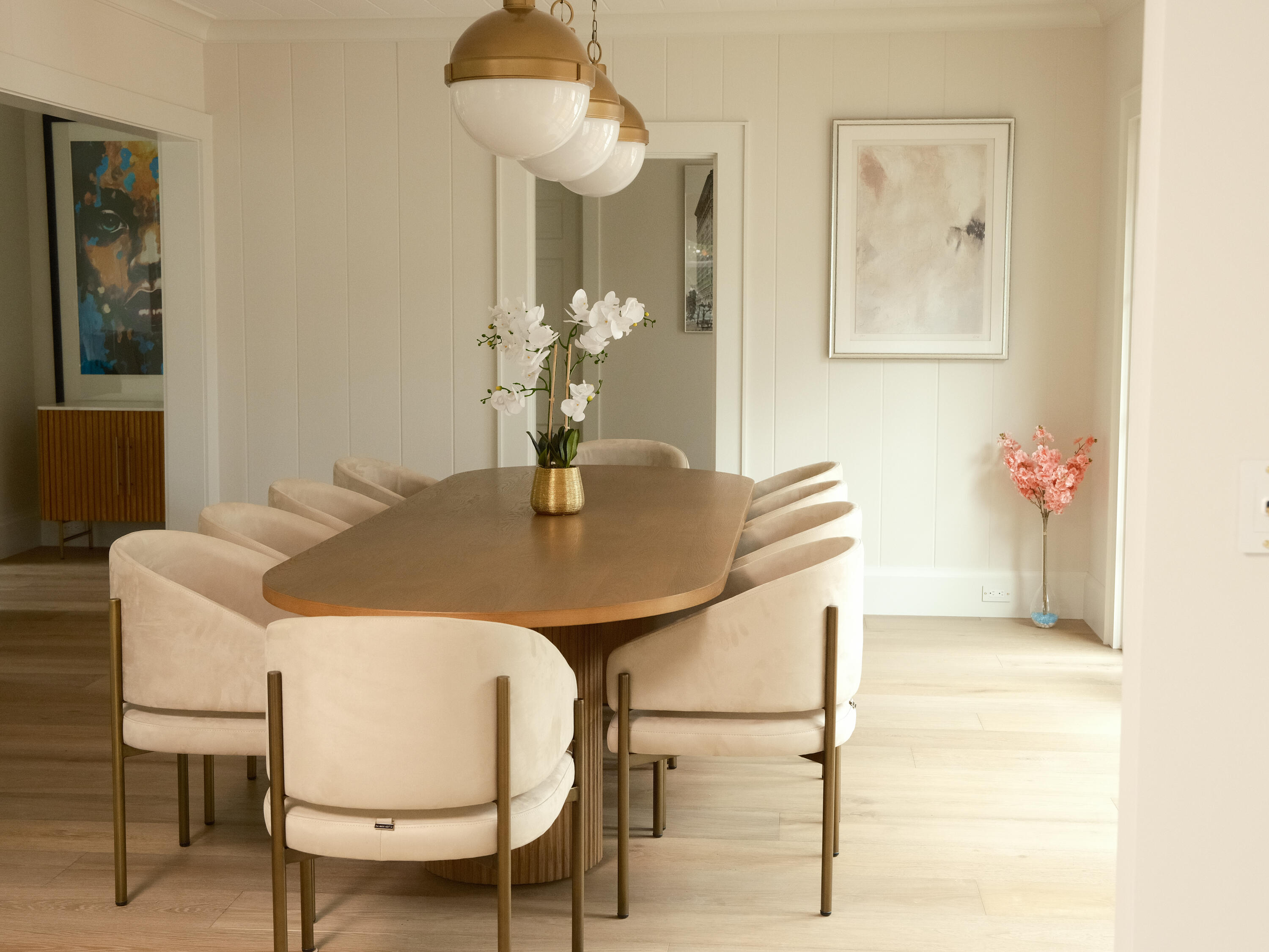 1017 Tamarind Road Delray Beach, FL 33483 - Photo 27 of 54 a dining room with furniture and chandelier