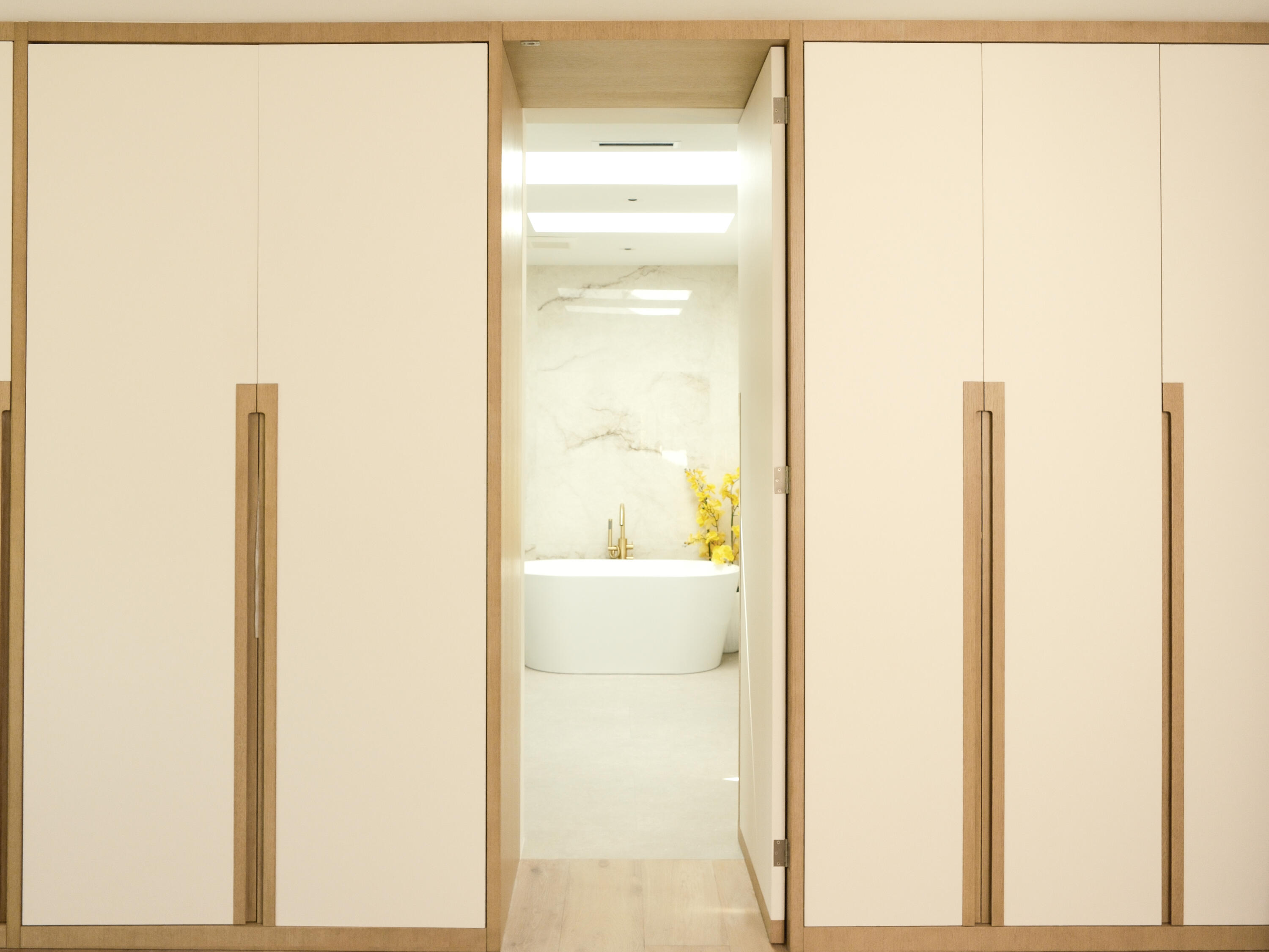 1017 Tamarind Road Delray Beach, FL 33483 - Photo 33 of 54 a bathroom with a glass shower door