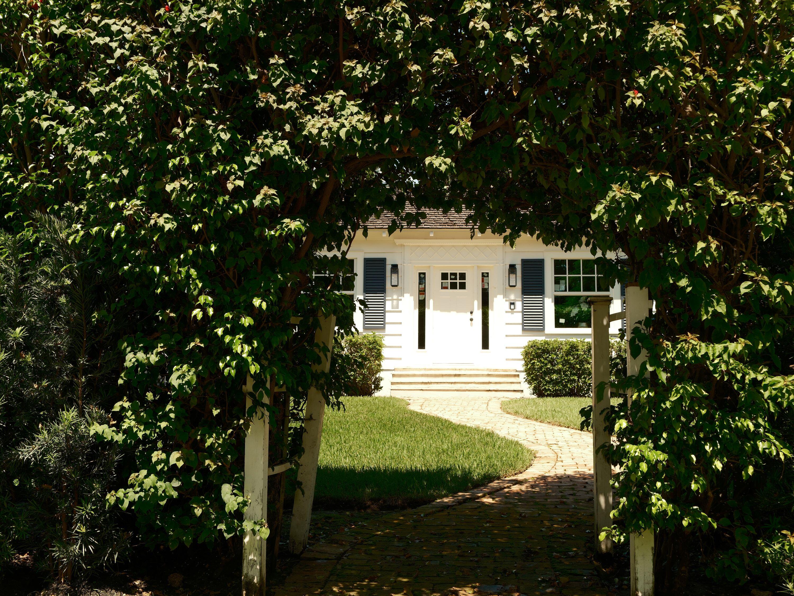 1017 Tamarind Road Delray Beach, FL 33483 - Photo 45 of 54 a view of house with a yard