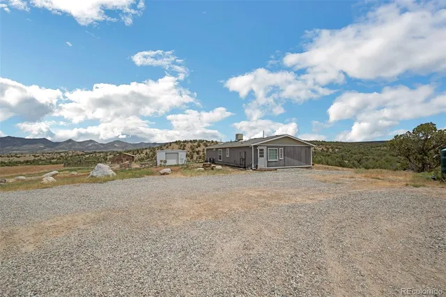 a view of a houses with sky view